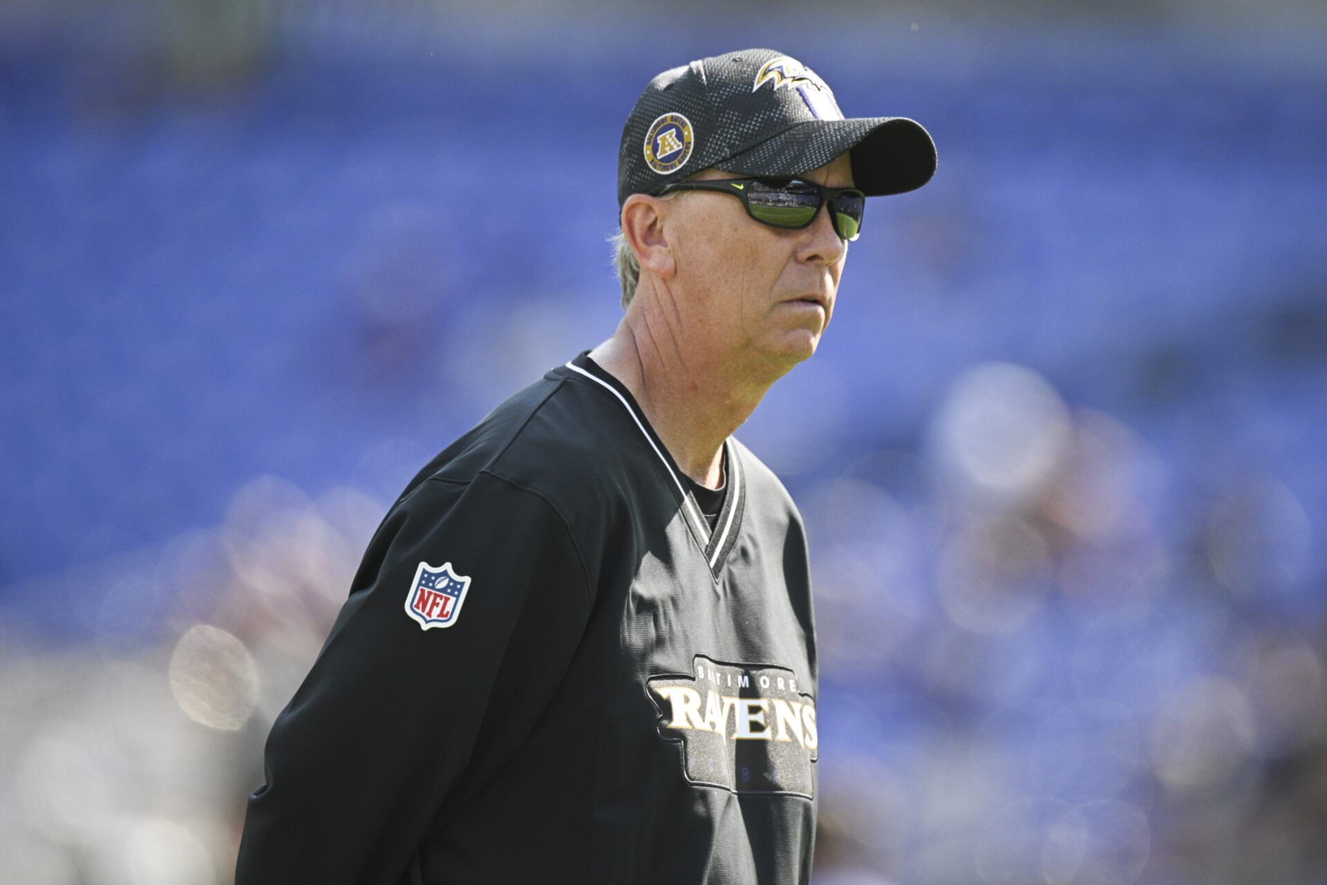 Baltimore Ravens offensive coordinator Todd Monken on the field before the game against the Washington Commanders at M&T Bank Stadium.