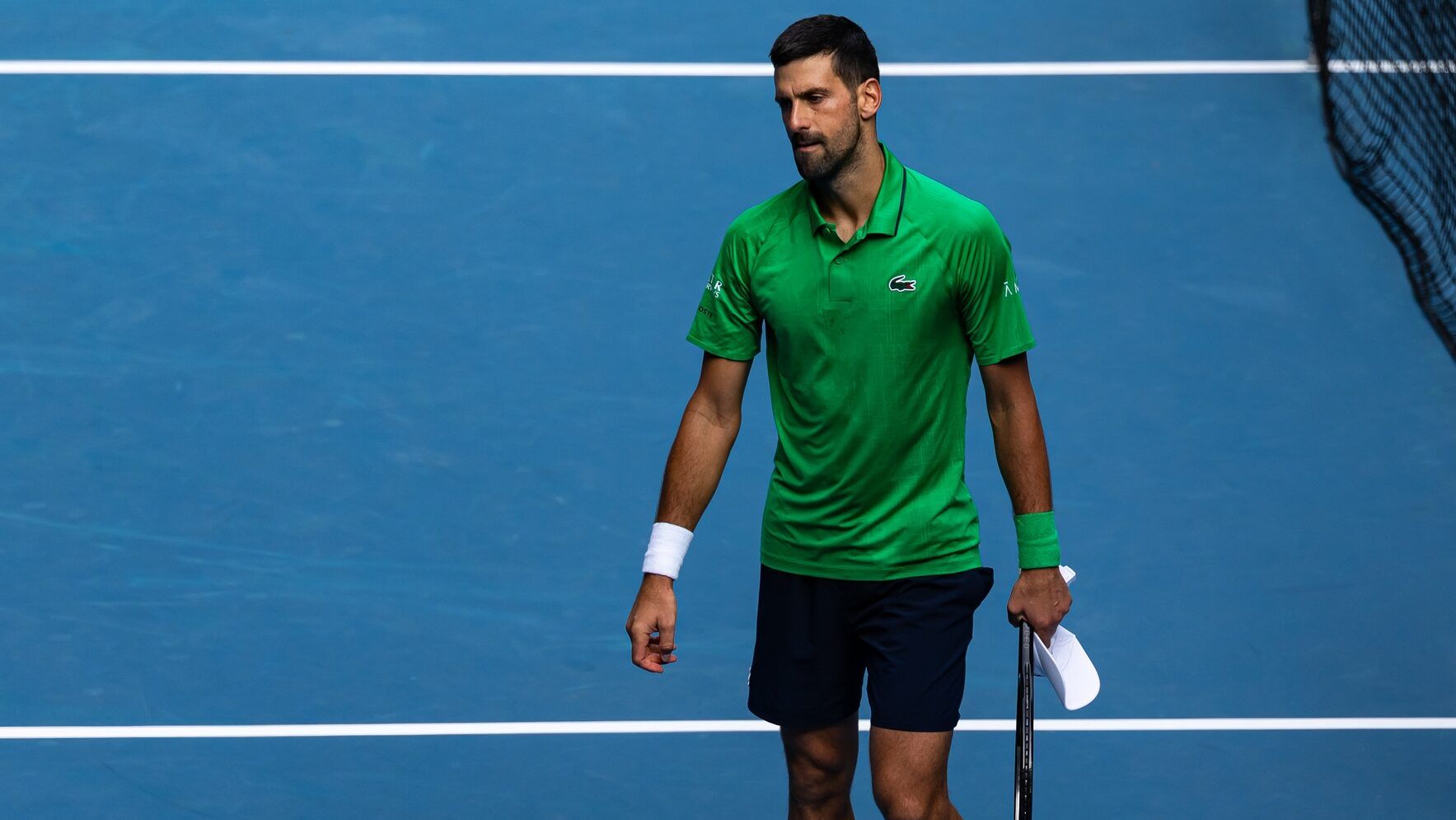 Novak Djokovic of Serbia in action against Lorenzo Musetti of Italy in the quarterfinals of the mens singles at the Australian Open at Rod Laver Arena in Melbourne Park.
