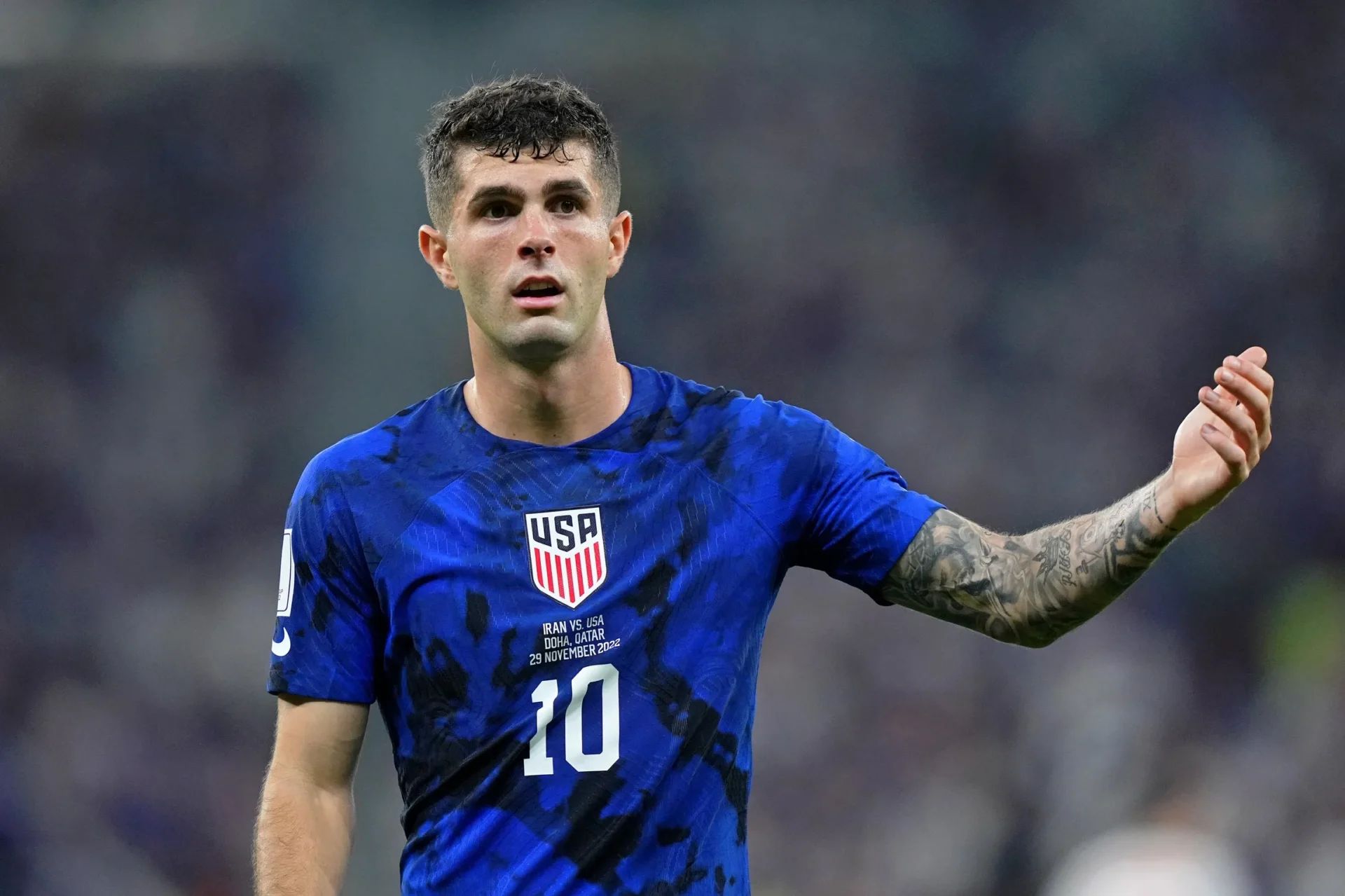 United States of America forward Christian Pulisic (10) reacts after a play against Iran during the first half of a group stage match during the 2022 World Cup at Al Thumama Stadium.
