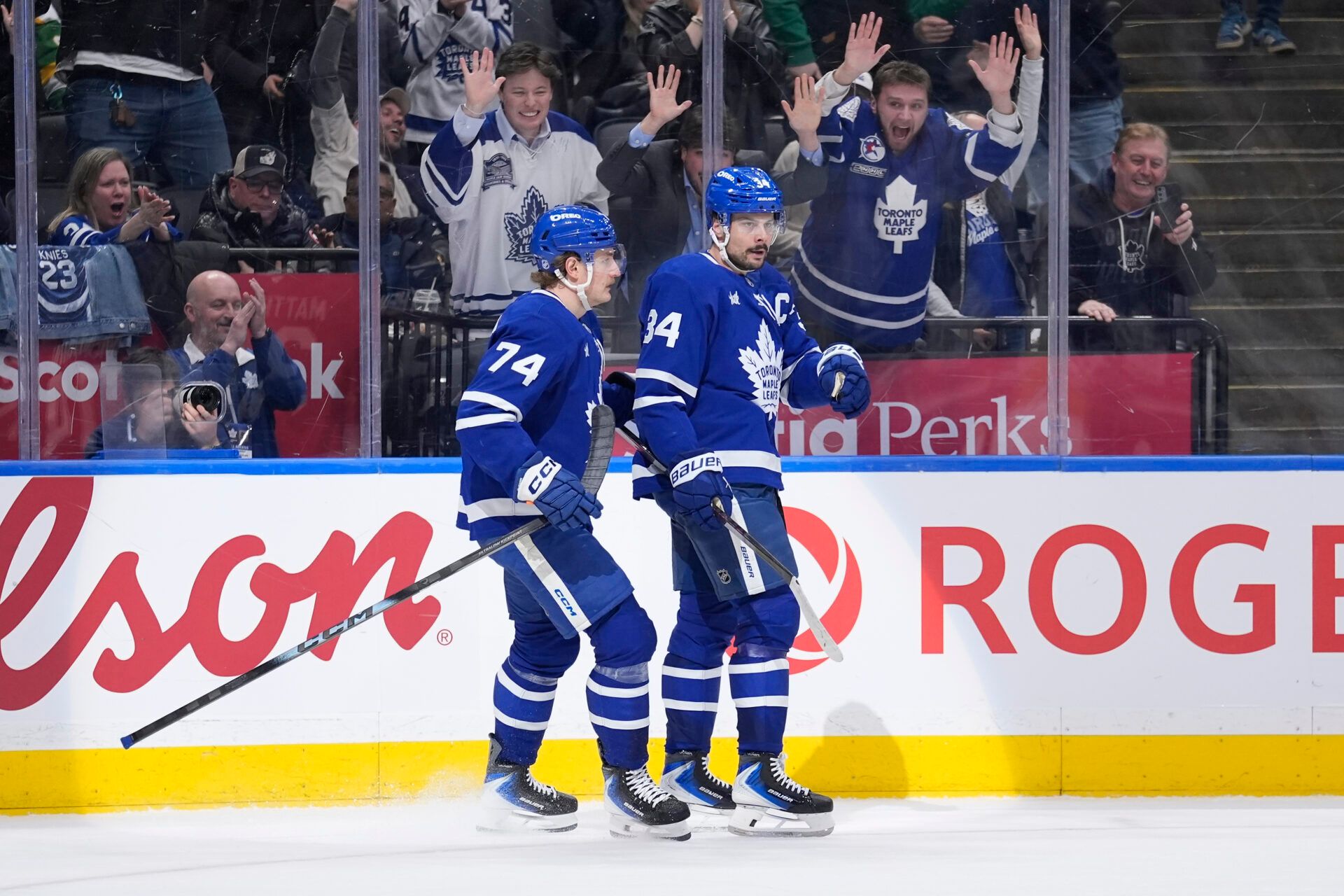Fans react after a goal scored by Toronto Maple Leafs forward Auston Matthews (34) against the Minnesota Wild during the third period at Scotiabank Arena.