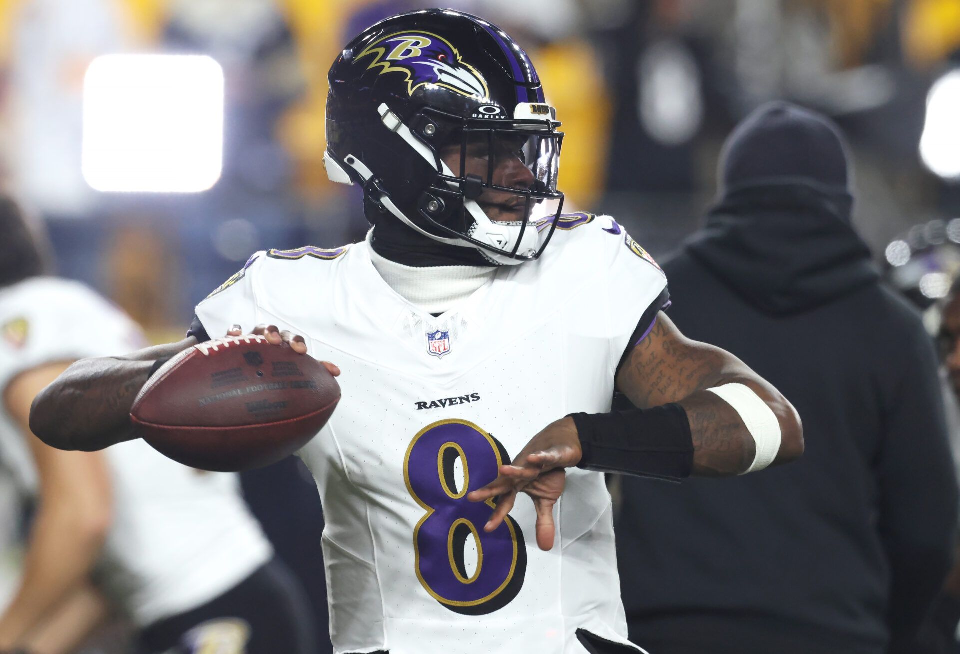 Baltimore Ravens quarterback Lamar Jackson (8) warms up before playing the Pittsburgh Steelers at Acrisure Stadium.