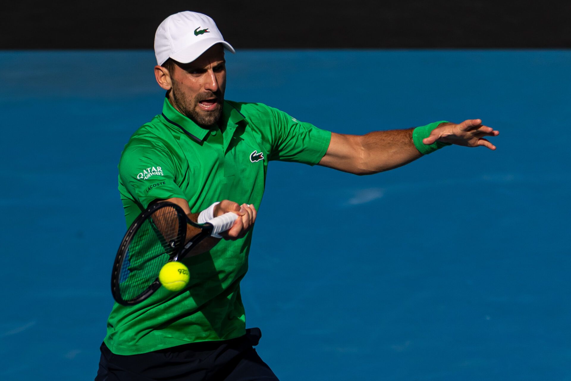 Novak Djokovic of Serbia in action against Lorenzo Musetti of Italy in the quarterfinals of the mens singles at the Australian Open at Rod Laver Arena in Melbourne Park.