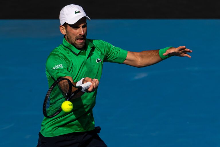 Novak Djokovic of Serbia in action against Lorenzo Musetti of Italy in the quarterfinals of the mens singles at the Australian Open at Rod Laver Arena in Melbourne Park.