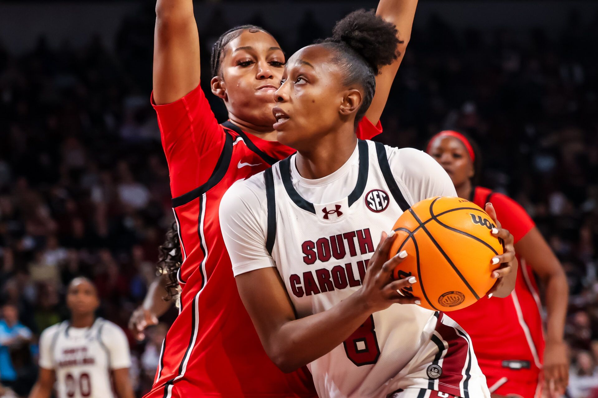 South Carolina Gamecocks forward Joyce Edwards (8) drives around Georgia Bulldogs forward Zhen Craft (8) in the first half at Colonial Life Arena.