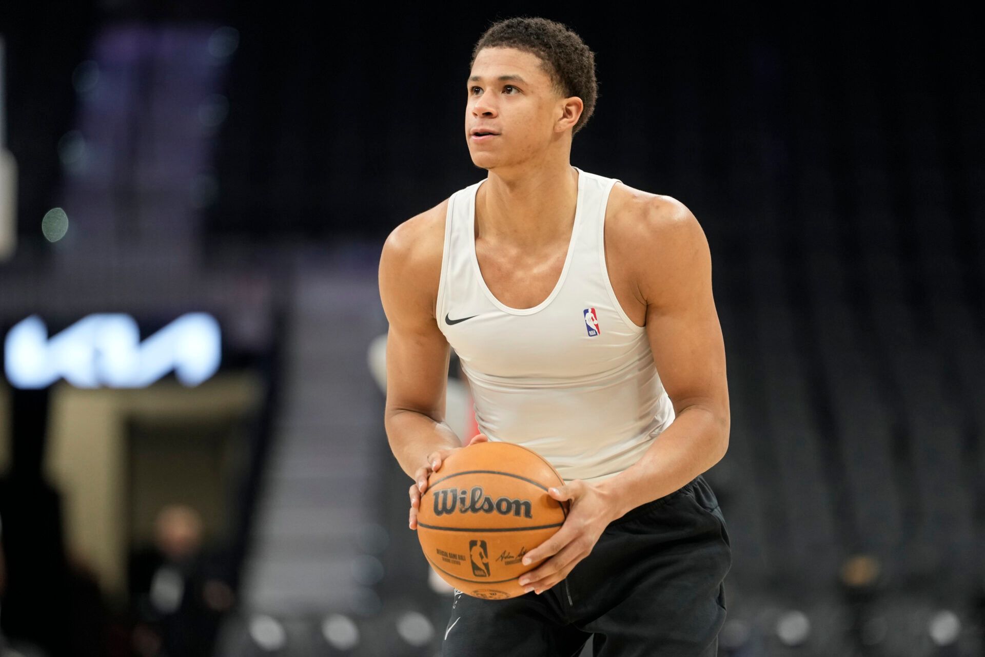 San Antonio Spurs forward Carter Bryant (11) warms up before a game against the Memphis Grizzlies at Frost Bank Center.