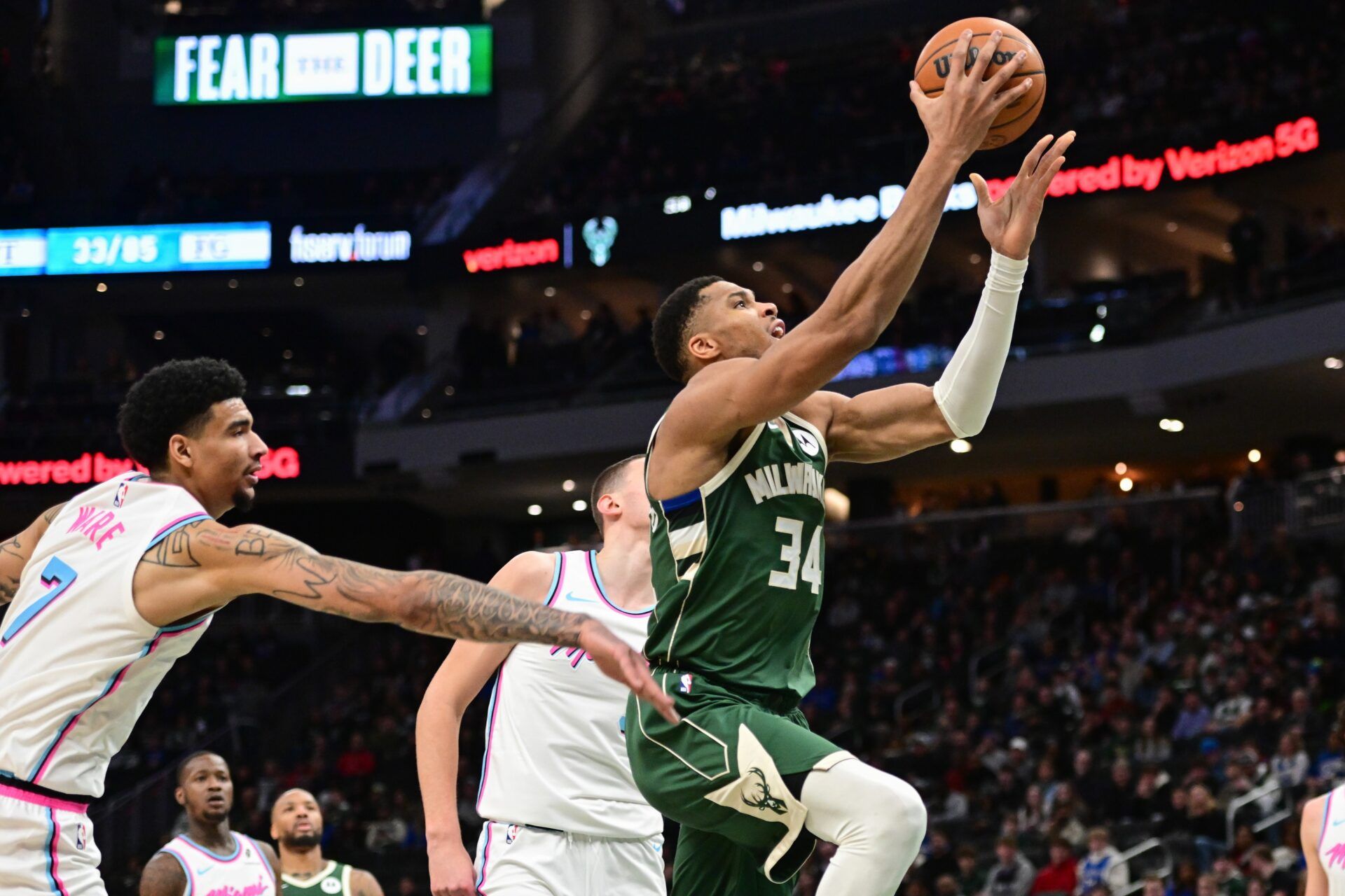 Milwaukee Bucks forward Giannis Antetokounmpo (34) takes a shot against Miami Heat center Kel'el Ware (7) in the fourth quarter at Fiserv Forum.