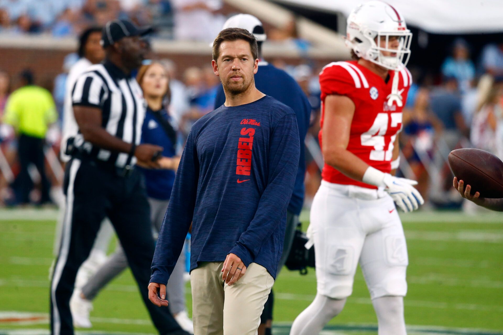 Mississippi Rebels offensive coordinator Charlie Weis Jr. watches during warm ups prior to the game against the Georgia Southern Eagles at Vaught-Hemingway Stadium.