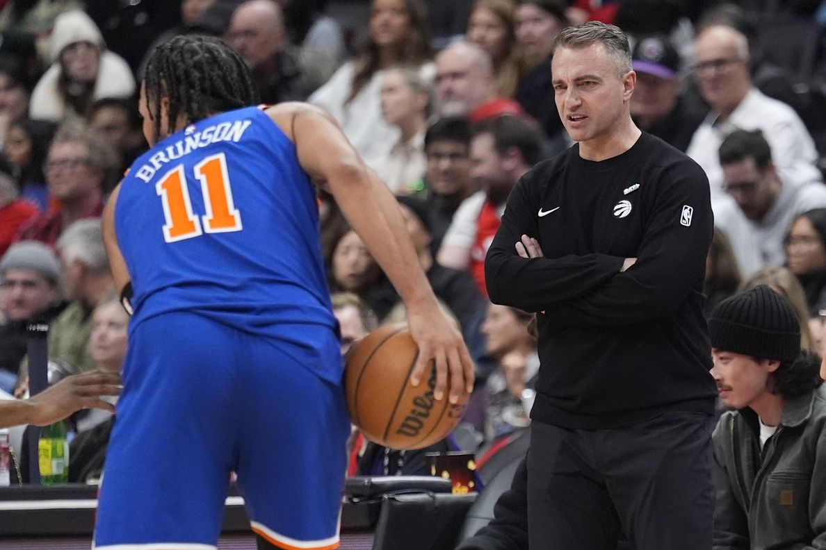 Toronto Raptors head coach Darko Rajakovic watches as New York Knicks guard Jalen Brunson (11) looks to make a play during the second half at Scotiabank Arena.
