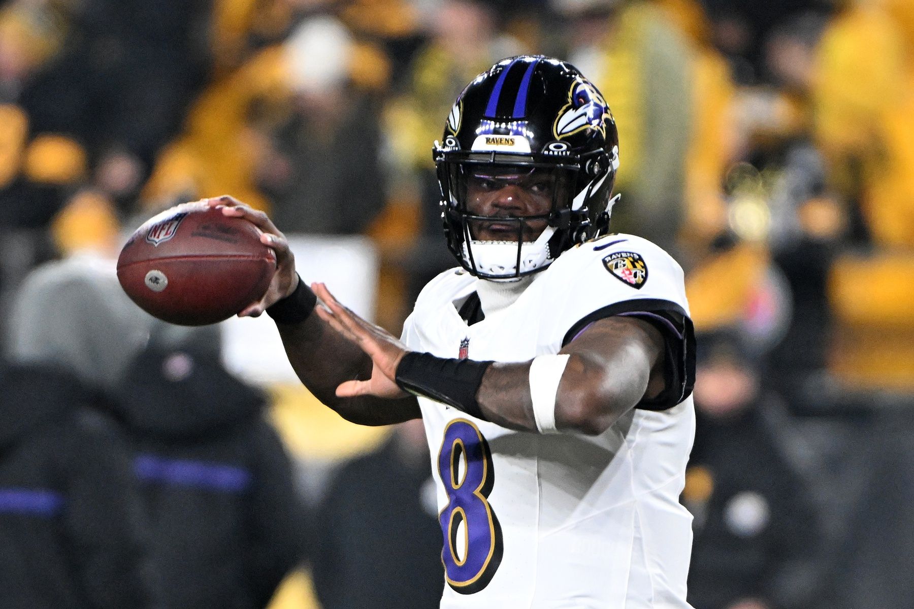 Baltimore Ravens quarterback Lamar Jackson (8) practices before the game at Acrisure Stadium.