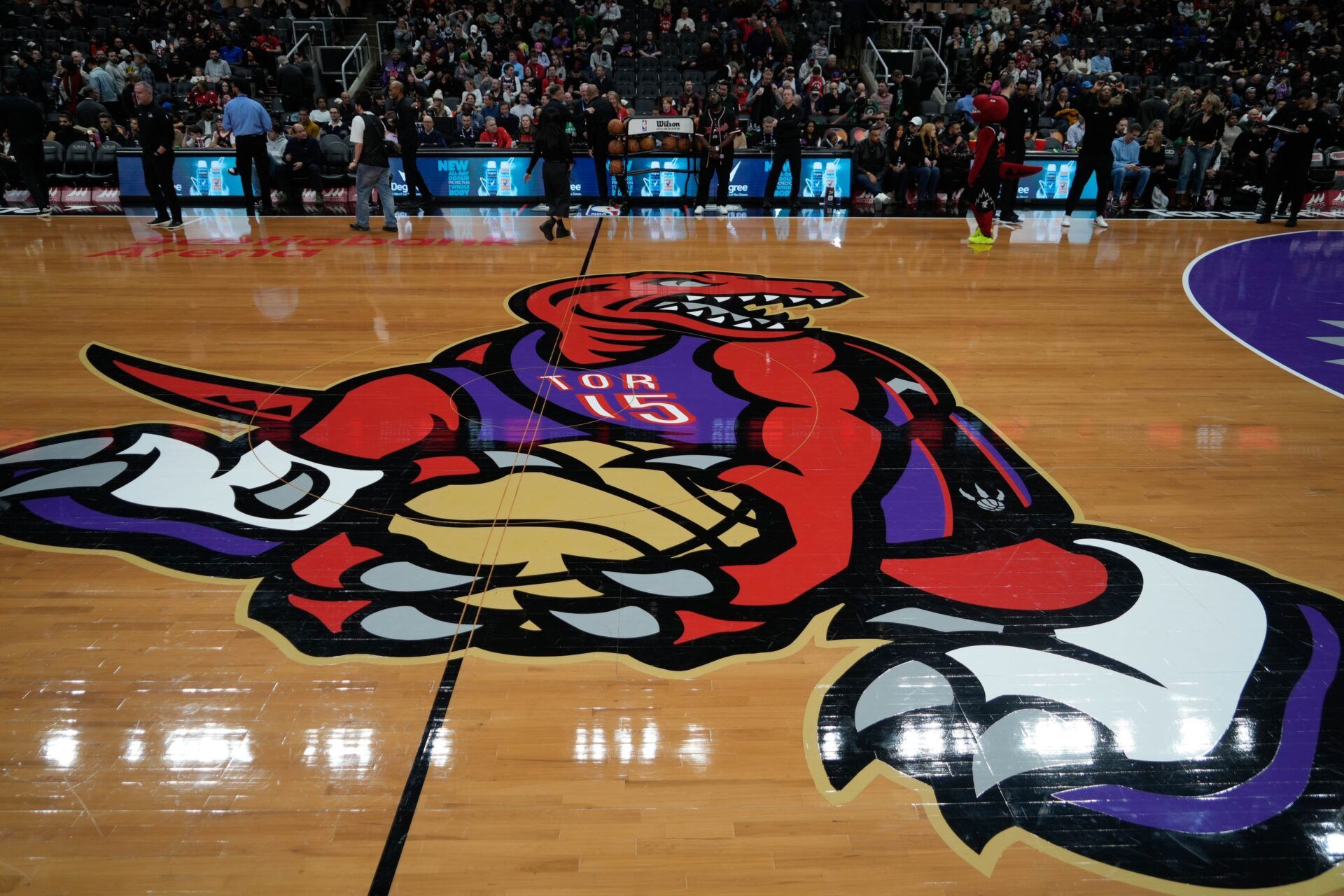 A view of the Toronto Raptors logo at center court for its city connect game against the Boston Celtics at Scotiabank Arena.