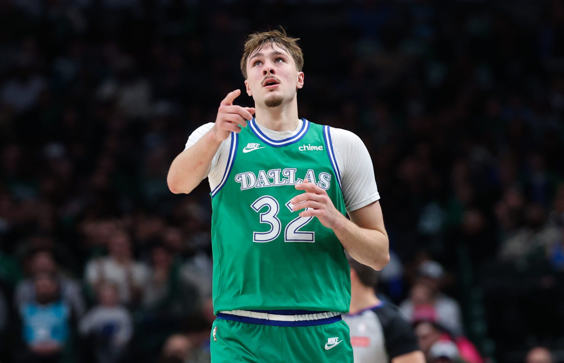 Dallas Mavericks forward Cooper Flagg (32) reacts during the second half against the Charlotte Hornets at American Airlines Center.