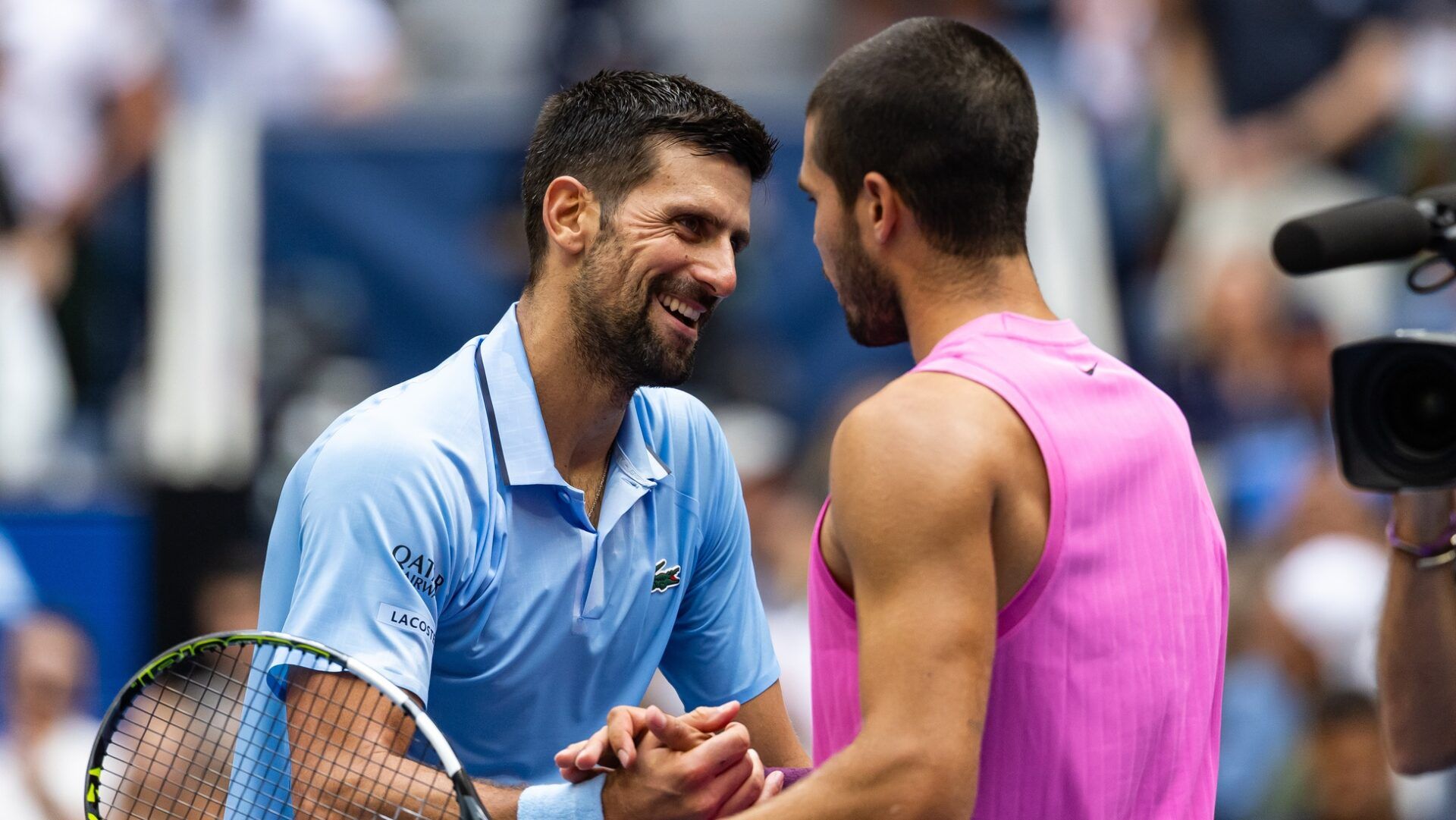 Carlos Alcaraz of Spain and Novak Djokovic of Serbia embraces after their match in the semifinal of the mens singles at the US Open at Arthur Ashe Stadium in Billie Jean King National Tennis Center.