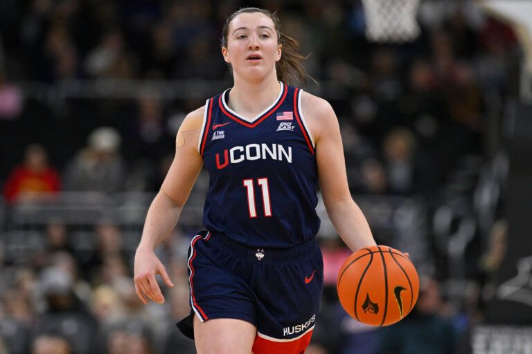 UConn Huskies guard Allie Ziebell (11) dribbles the ball during the first half against the Providence Friars at the Amica Mutual Pavilion.