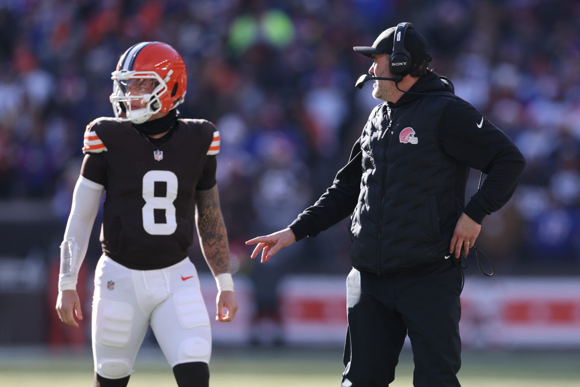 Cleveland Browns head coach Kevin Stefanski talks with quarterback Dillon Gabriel (8) before he enters the game against the Buffalo Bills during the first half at Huntington Bank Field.
