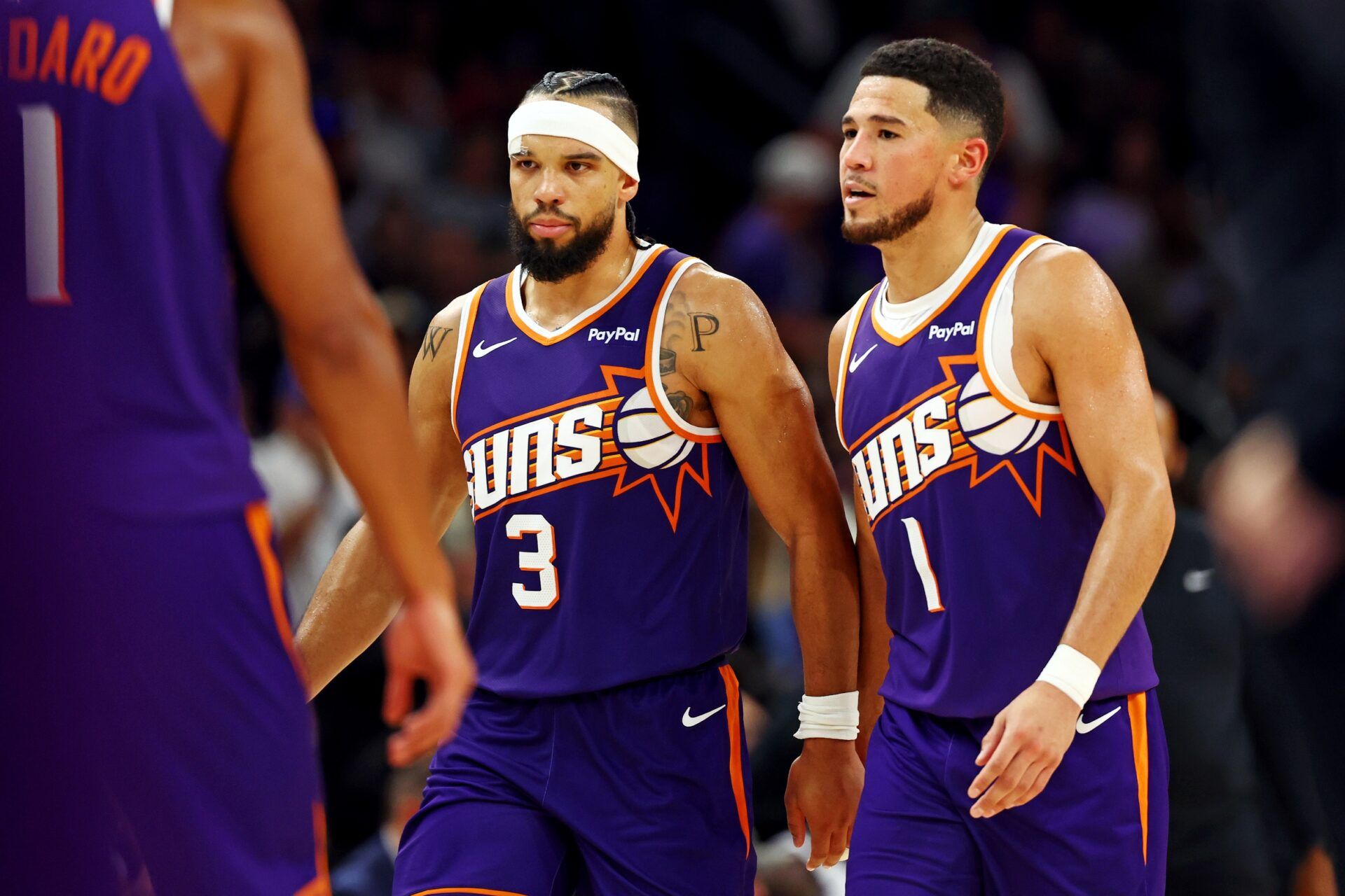 Phoenix Suns guard Devin Booker (1) and forward Dillon Brooks (3) during the second half against the Sacramento Kings at the Mortgage Matchup Center.