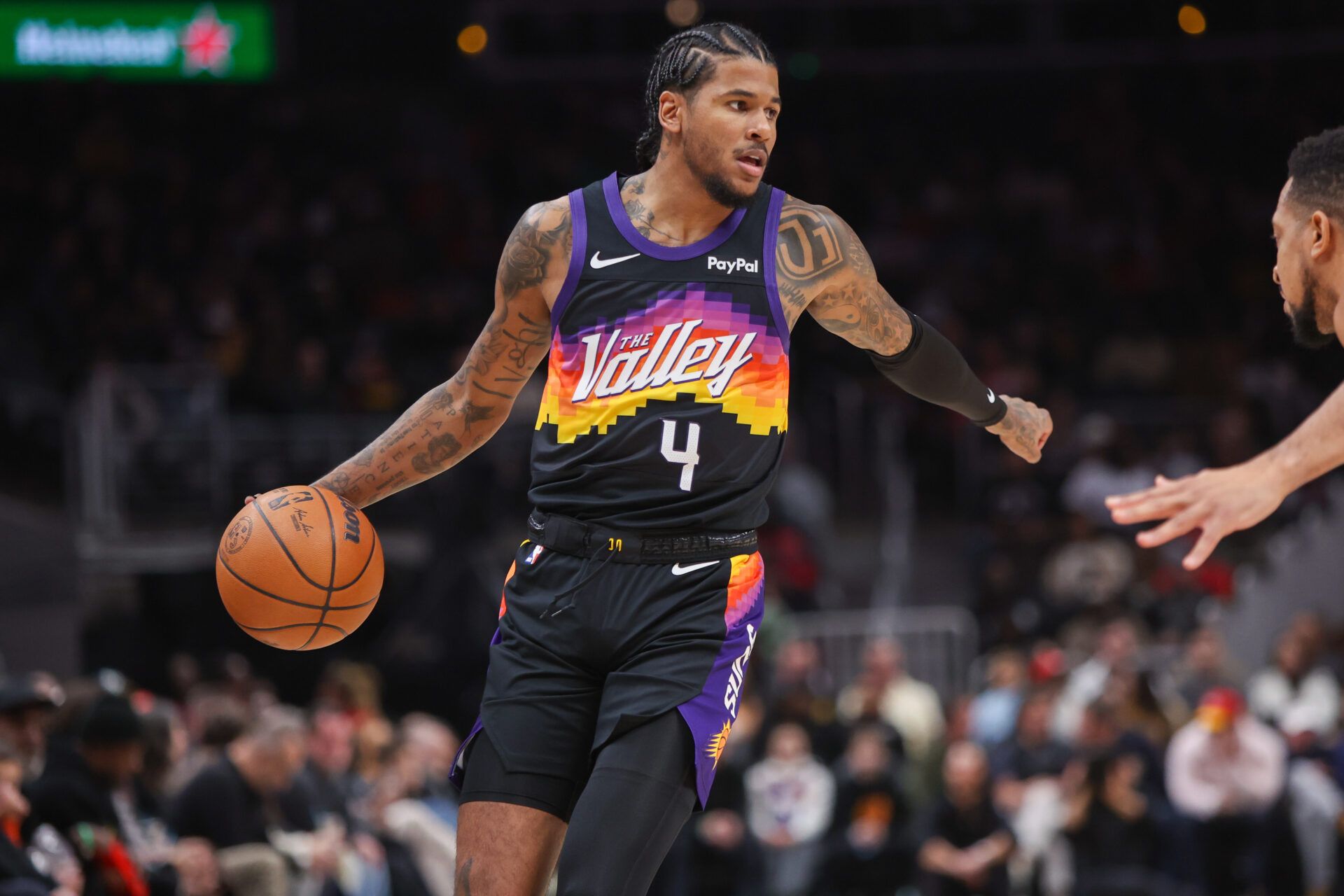 Phoenix Suns guard Jalen Green (4) dribbles against the Atlanta Hawks in the first quarter at State Farm Arena.