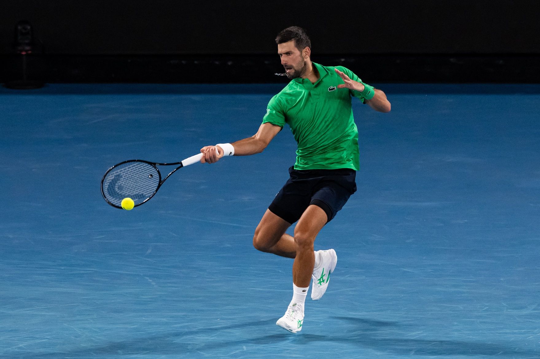Novak Djokovic of Serbia in action against Jannik Sinner of Italy in the semifinals of the mens singles at the Australian Open at Rod Laver Arena in Melbourne Park.