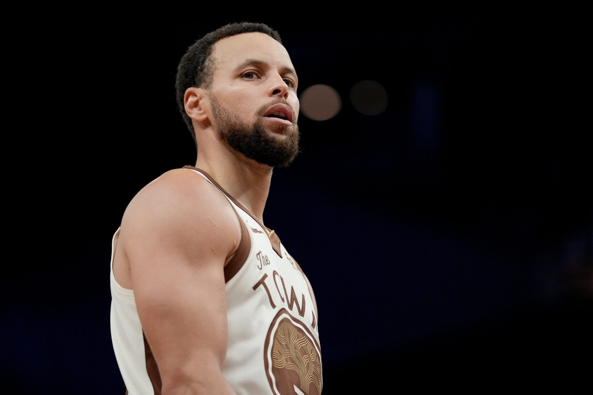 Golden State Warriors guard Stephen Curry (30) stands on the court during a break in the action against the Detroit Pistons in the third quarter at the Chase Center.