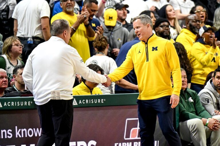 Michigan State's head coach Tom Izzo, left, shakes hands with Michigan's head coach Dusty May after the game on Friday, Jan. 30, 2026, at the Breslin Center in East Lansing.