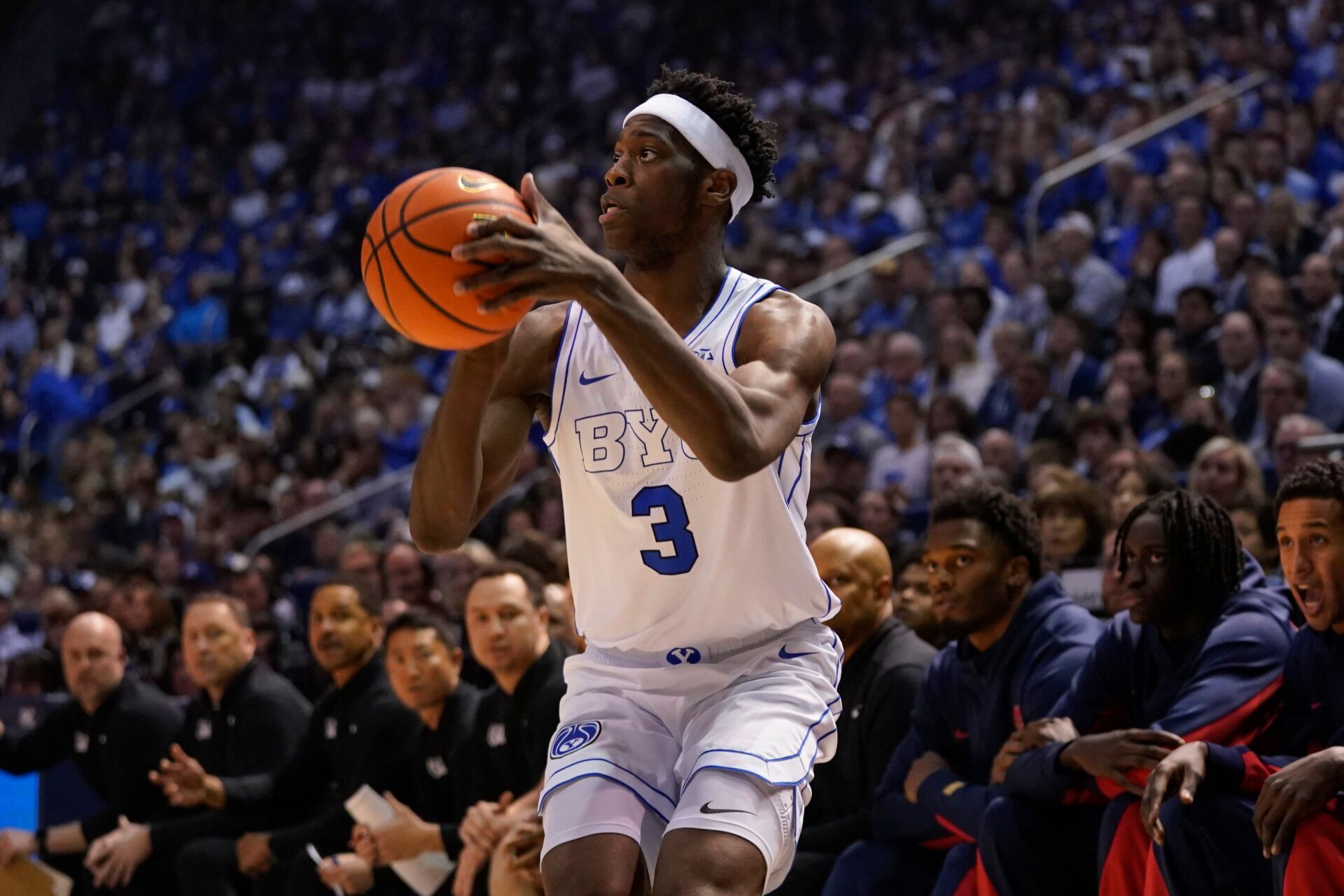 BYU Cougars forward AJ Dybantsa (3) takes a three point shot during the first half against the Arizona Wildcats at Marriott Center.