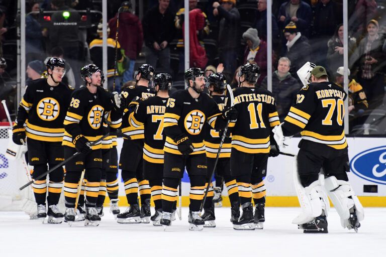 The Boston Bruins celebrate their win at TD Garden.