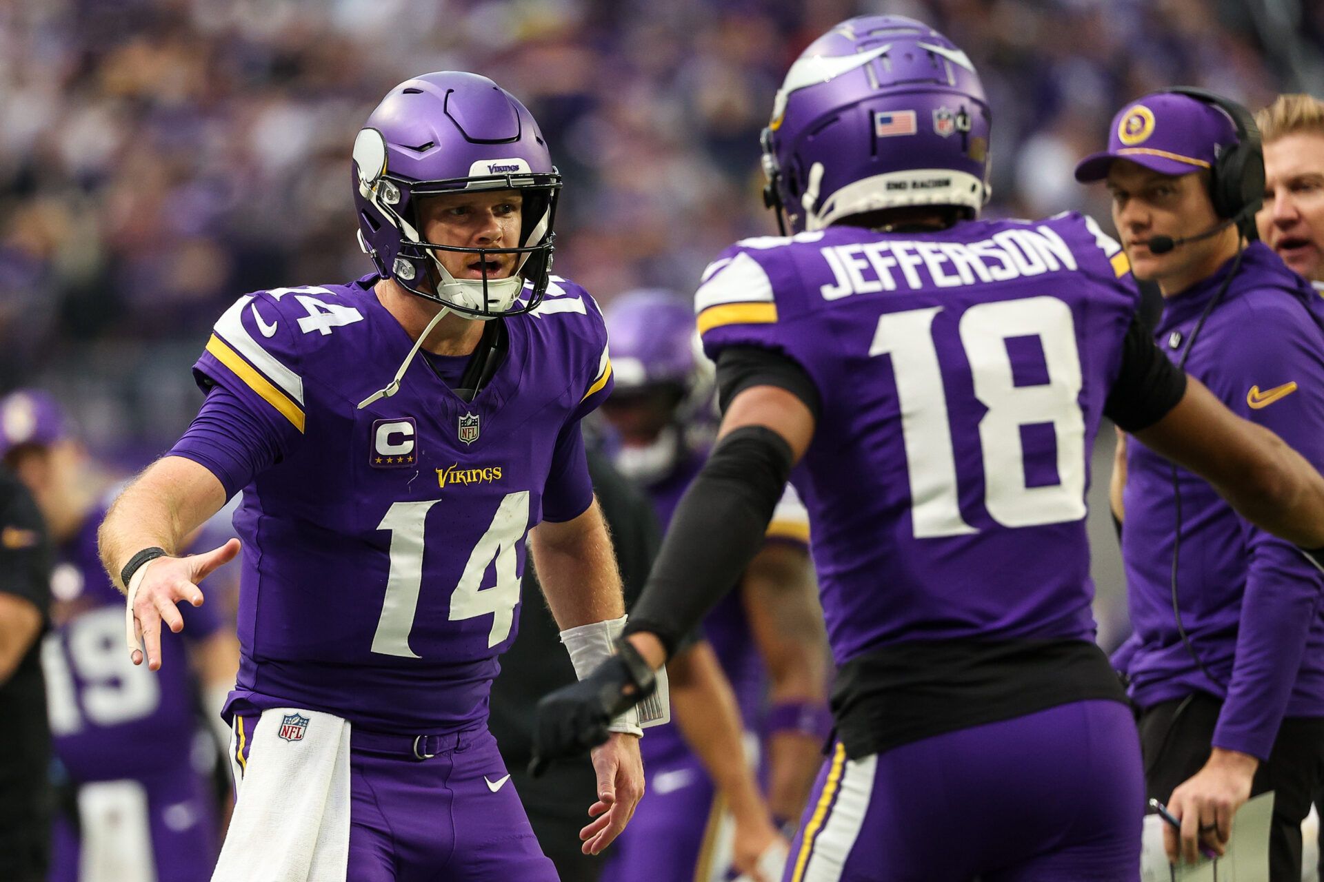 Minnesota Vikings quarterback Sam Darnold (14) celebrates his touchdown pass to wide receiver Justin Jefferson (18) against the Atlanta Falcons during the second quarter at U.S. Bank Stadium.