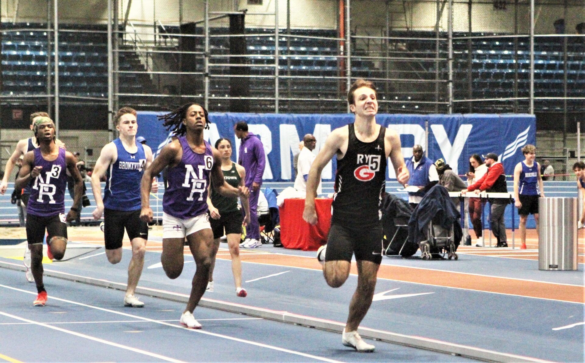 R-L: Rye's Ben Truman, New Rochelle's Anthony Athanase, Bronxville's Grant Patterson and New Rochelle's Adoni Boymandi head for the finish of the boys 600-meter race during the Westchester indoor track and field championships at The Armory in New York City Jan. 24, 2026.