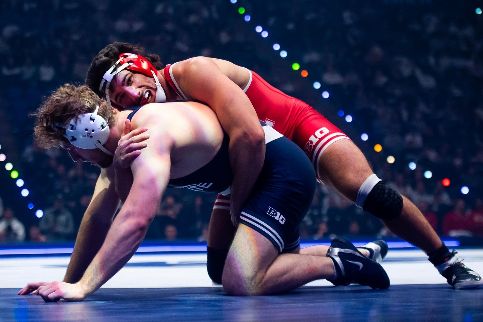 Nebraska's AJ Ferrari, top, wrestles Penn State's Cole Mirasola in the heavyweight bout during a Big Ten dual meet on January 30, 2026, in State College. Penn State won the dual, 26-12.