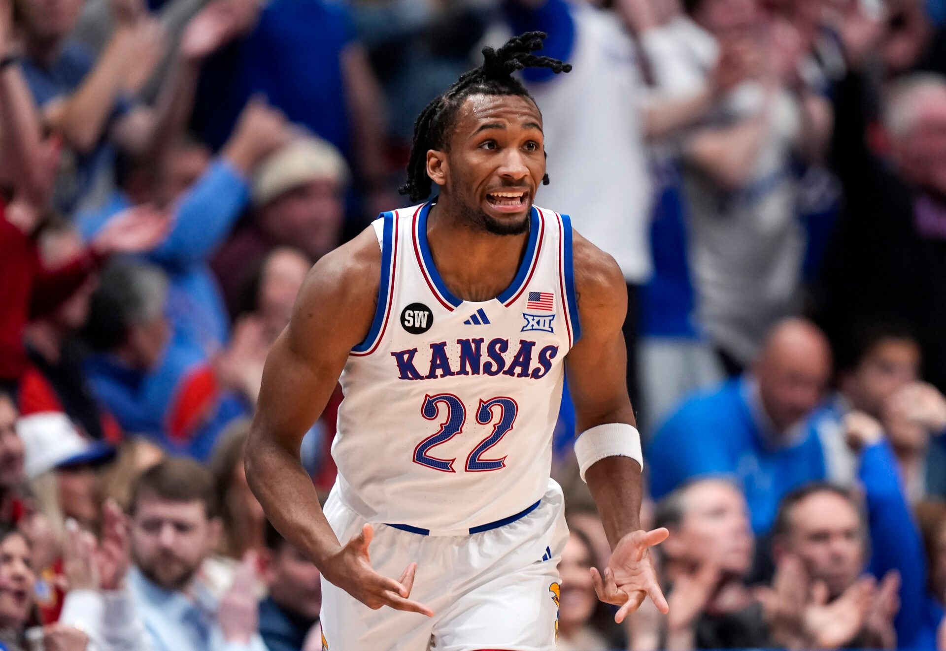 Kansas Jayhawks guard Darryn Peterson (22) reacts after scoring during the first half against the BYU Cougars at Allen Fieldhouse.