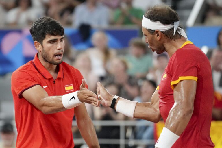 Carlos Alcaraz (Spain) and Rafael Nadal (Spain) during the Paris 2024 Olympic Summer Games at Stade Roland Garros.