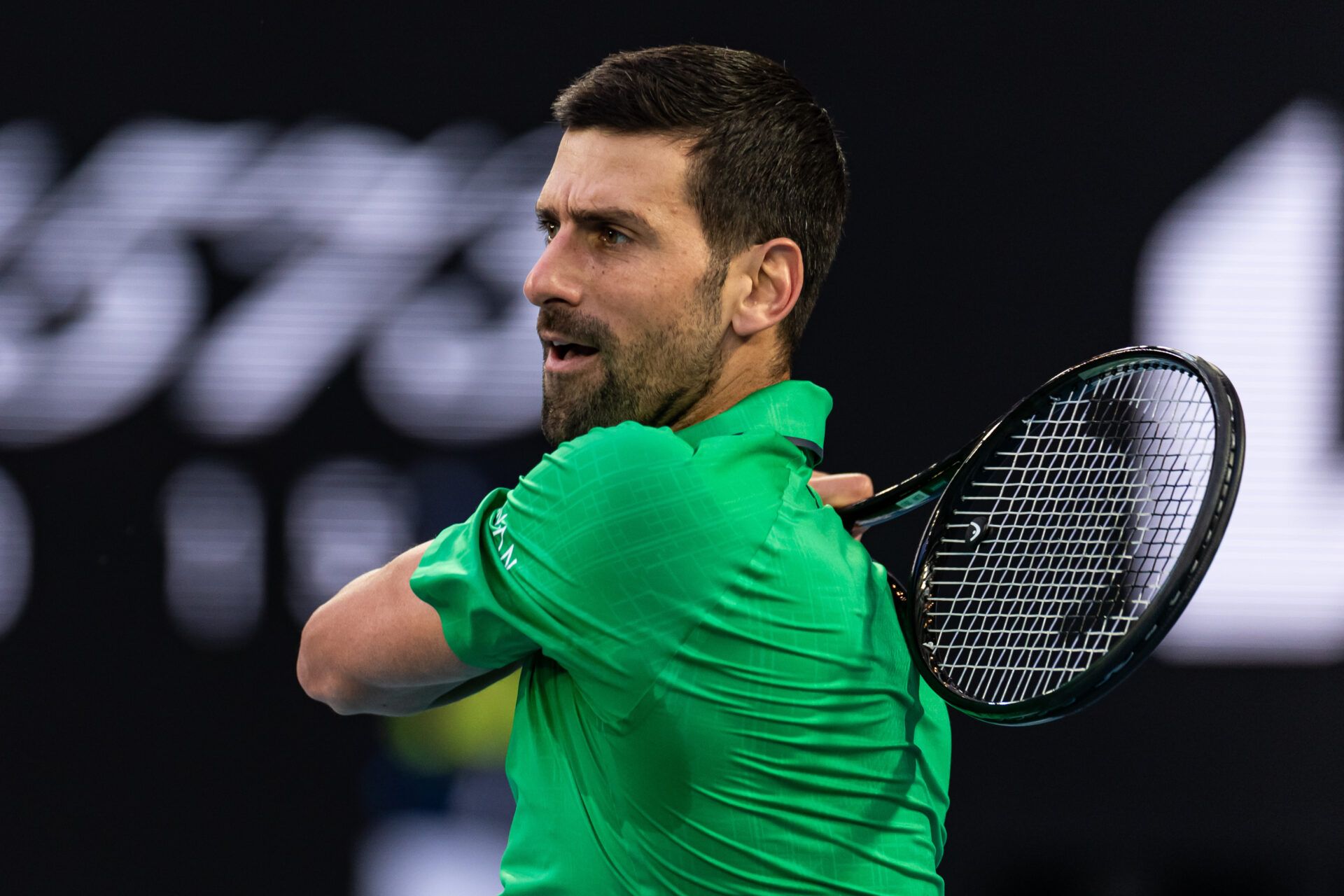 Novak Djokovic of Serbia in action against Carlos Alcaraz of Spain in the final of the mens singles at the Australian Open at Rod Laver Arena in Melbourne Park.