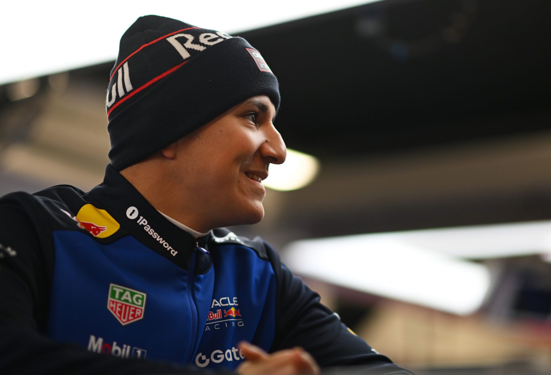 MONTMELO, SPAIN - JANUARY 26: Isack Hadjar of France and Oracle Red Bull Racing prepares to drive in the garage during day one of F1 Shakedown at Circuit de Catalunya on January 26, 2026 in Montmelo, Spain. (Photo by Rudy Carezzevoli/Getty Images)