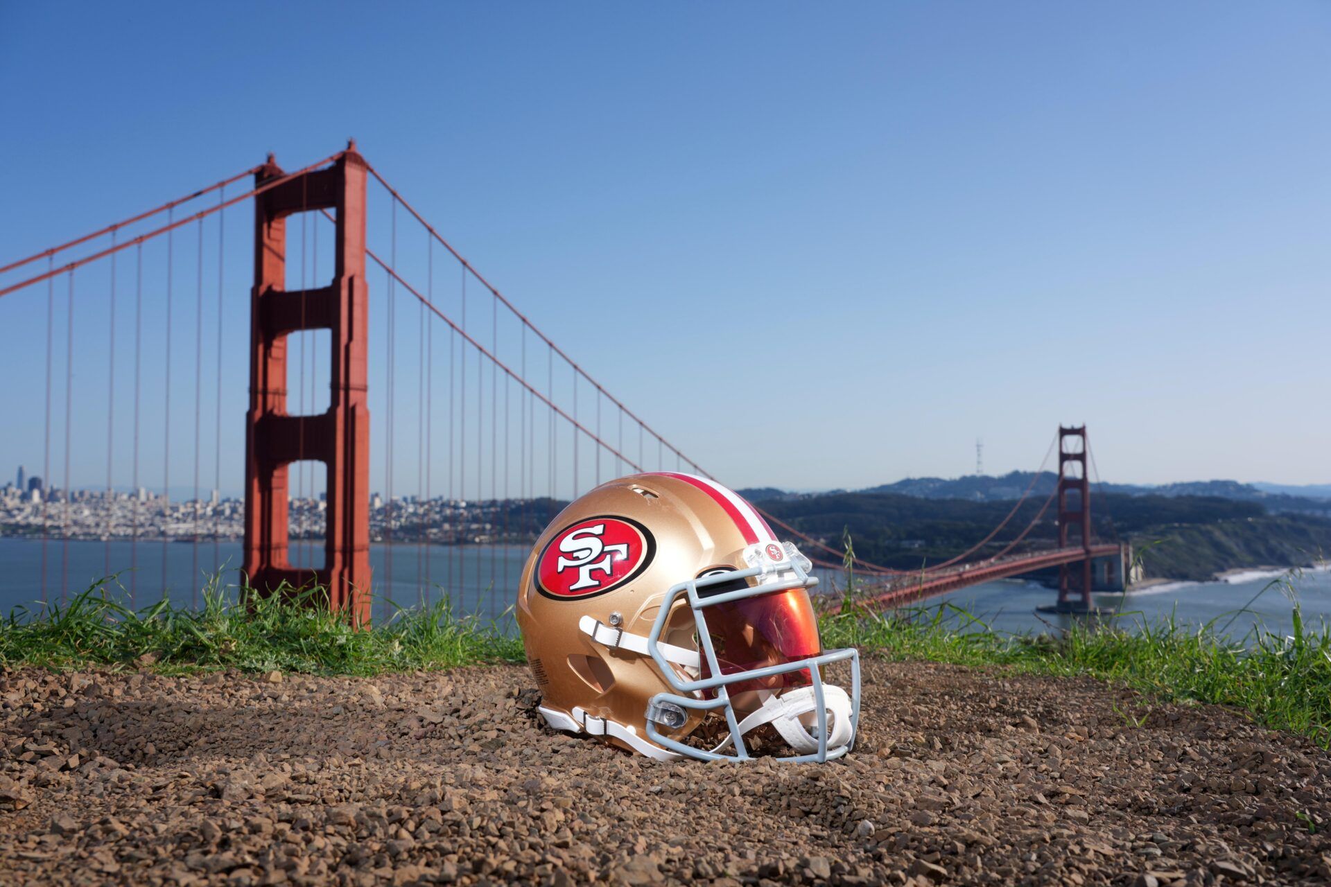 A San Francisco 49ers helmet at the Golden Gate bridge.
