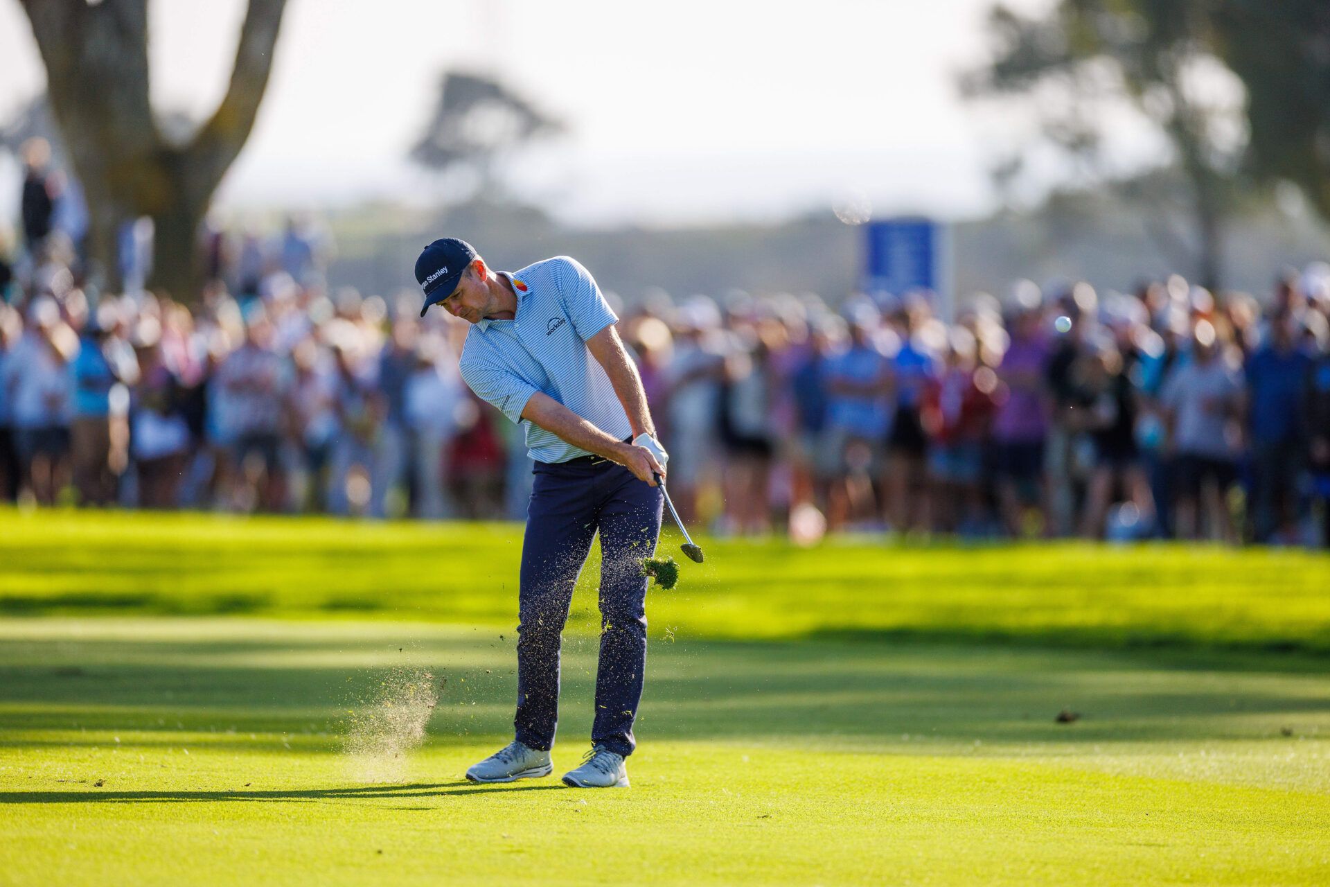 Justin Rose plays his shot from the fairway on the 18th hole during the third round of the Farmers Insurance Open golf tournament at Torrey Pines Municipal Golf Course - South Course.