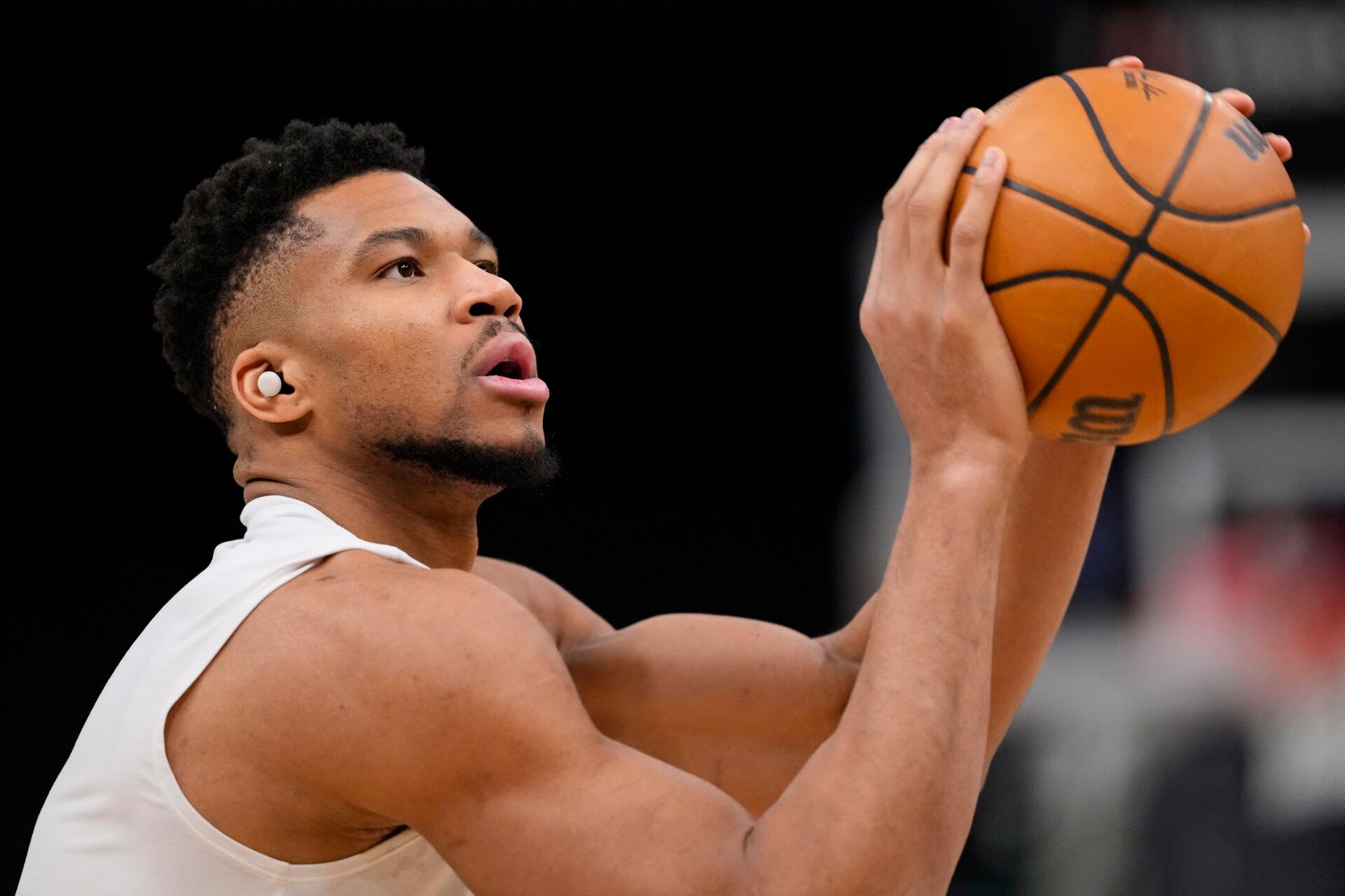 Milwaukee Bucks forward Giannis Antetokounmpo (34) shoots during warmups prior to the game against the Denver Nuggets at Fiserv Forum.
