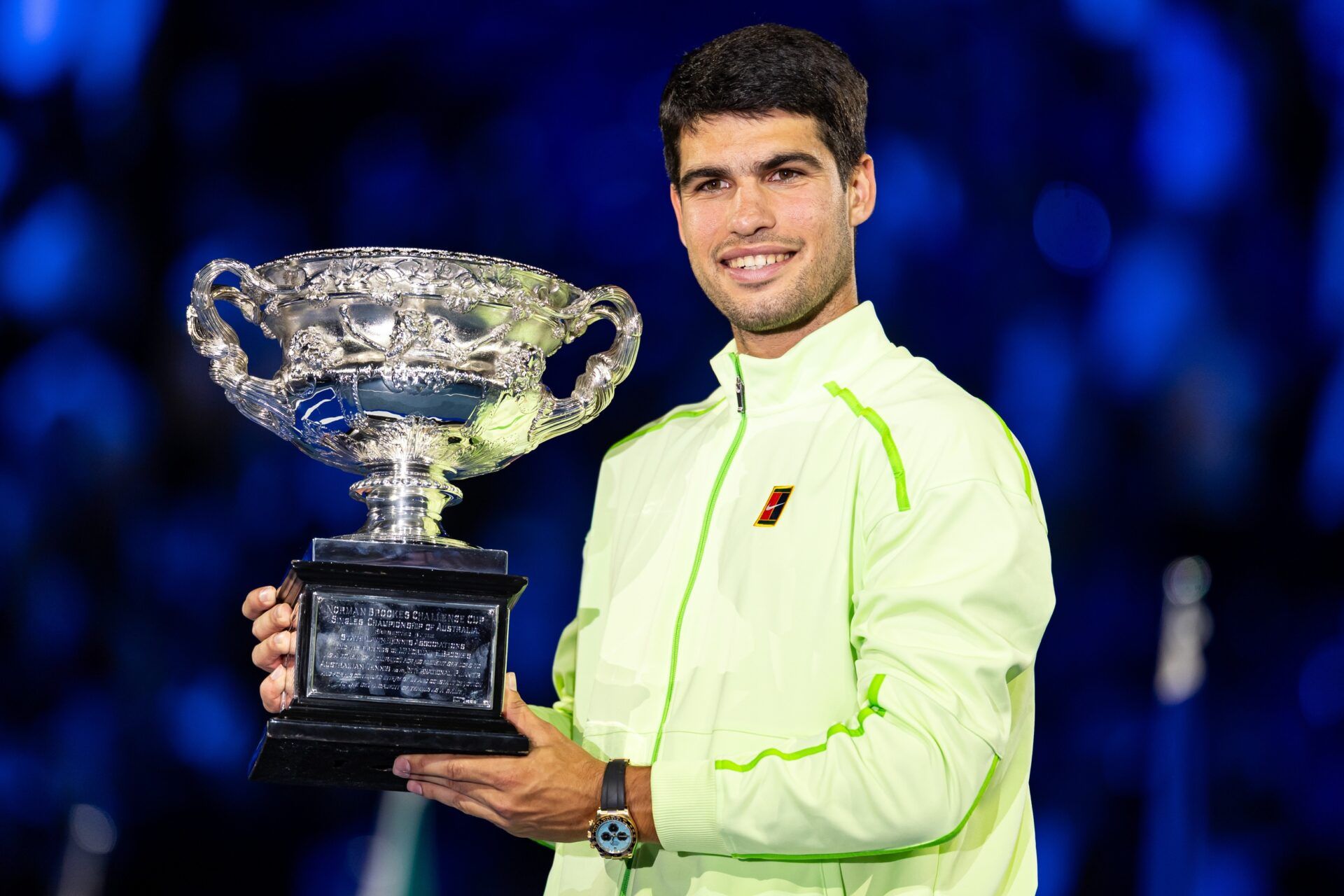 Carlos Alcaraz of Spain with the Norman Brookes Challenge Cup after his victory over Novak Djokovic of Serbia in the final of the mens singles at the Australian Open at Rod Laver Arena in Melbourne Park.