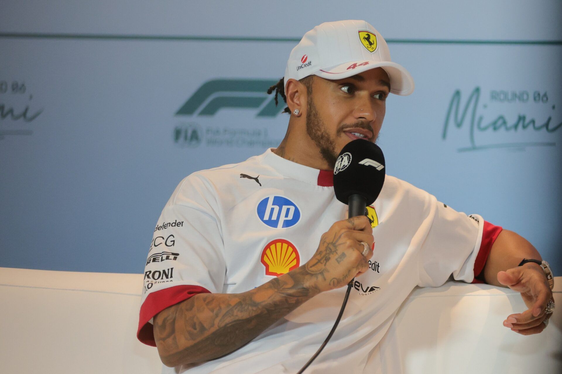 Ferrari driver Lewis Hamilton (44) talks to reporters during a press conference at Miami International Autodrome.