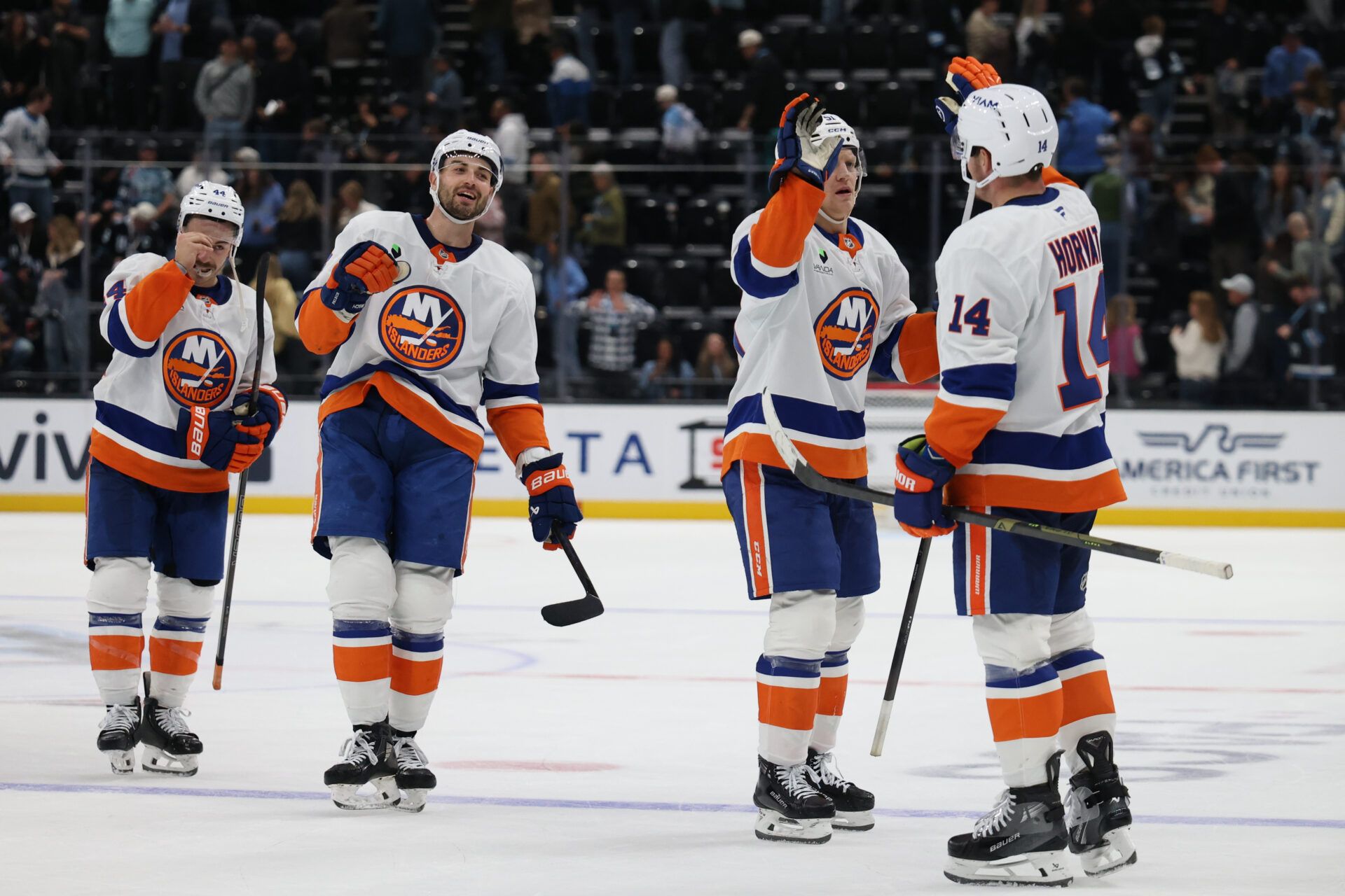 New York Islanders players celebrate at Delta Center.