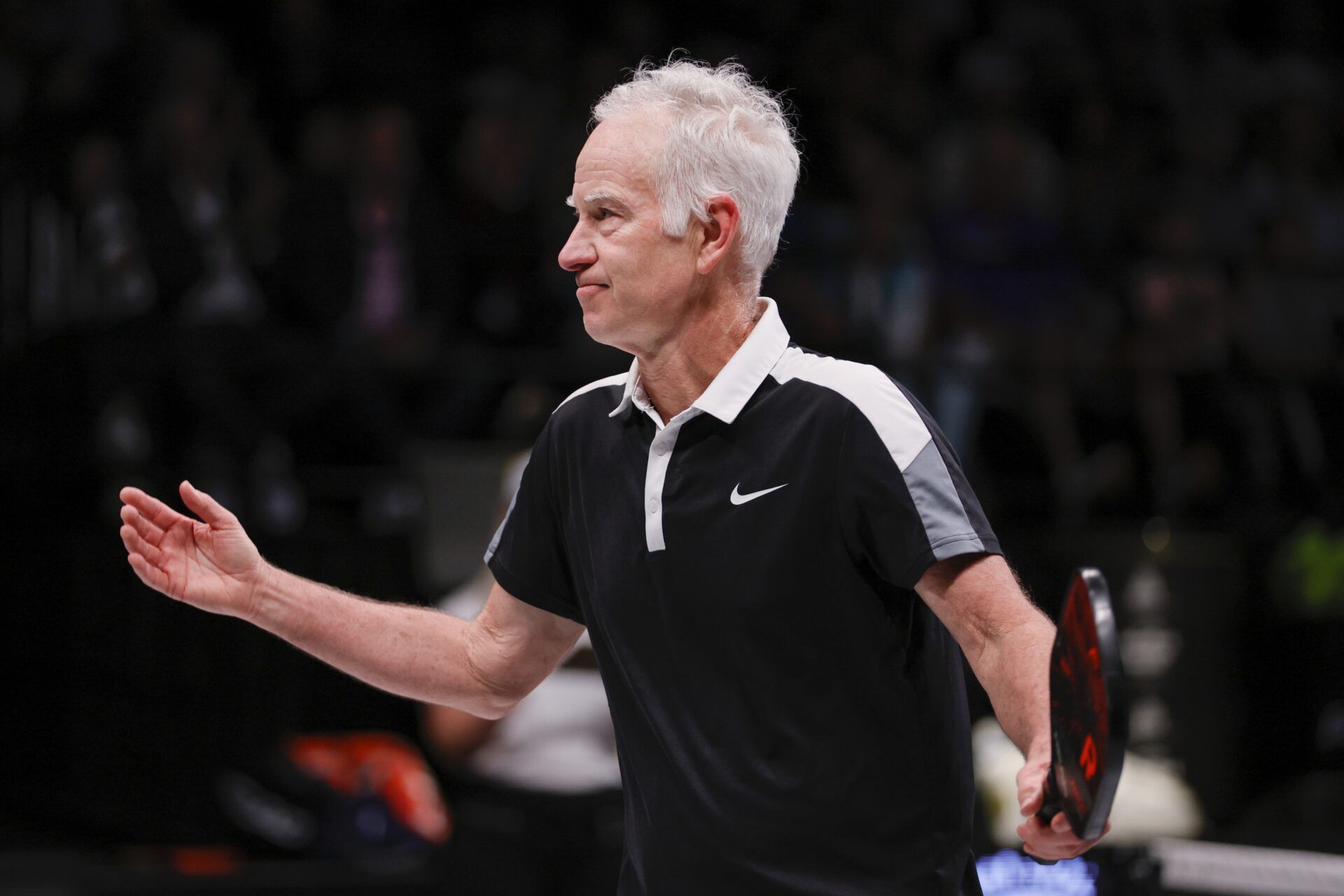 John McEnroe reacts after a point against Andre Agassi (not pictured) during a singles match at the Pickleball Slam at Hard Rock Live at Seminole Hard Rock Hotel & Casino.
