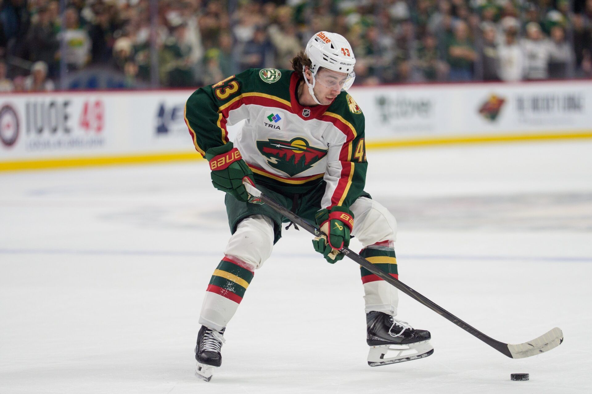 Minnesota Wild defenseman Quinn Hughes (43) skates with the puck against the Florida Panthers in overtime at Grand Casino Arena.
