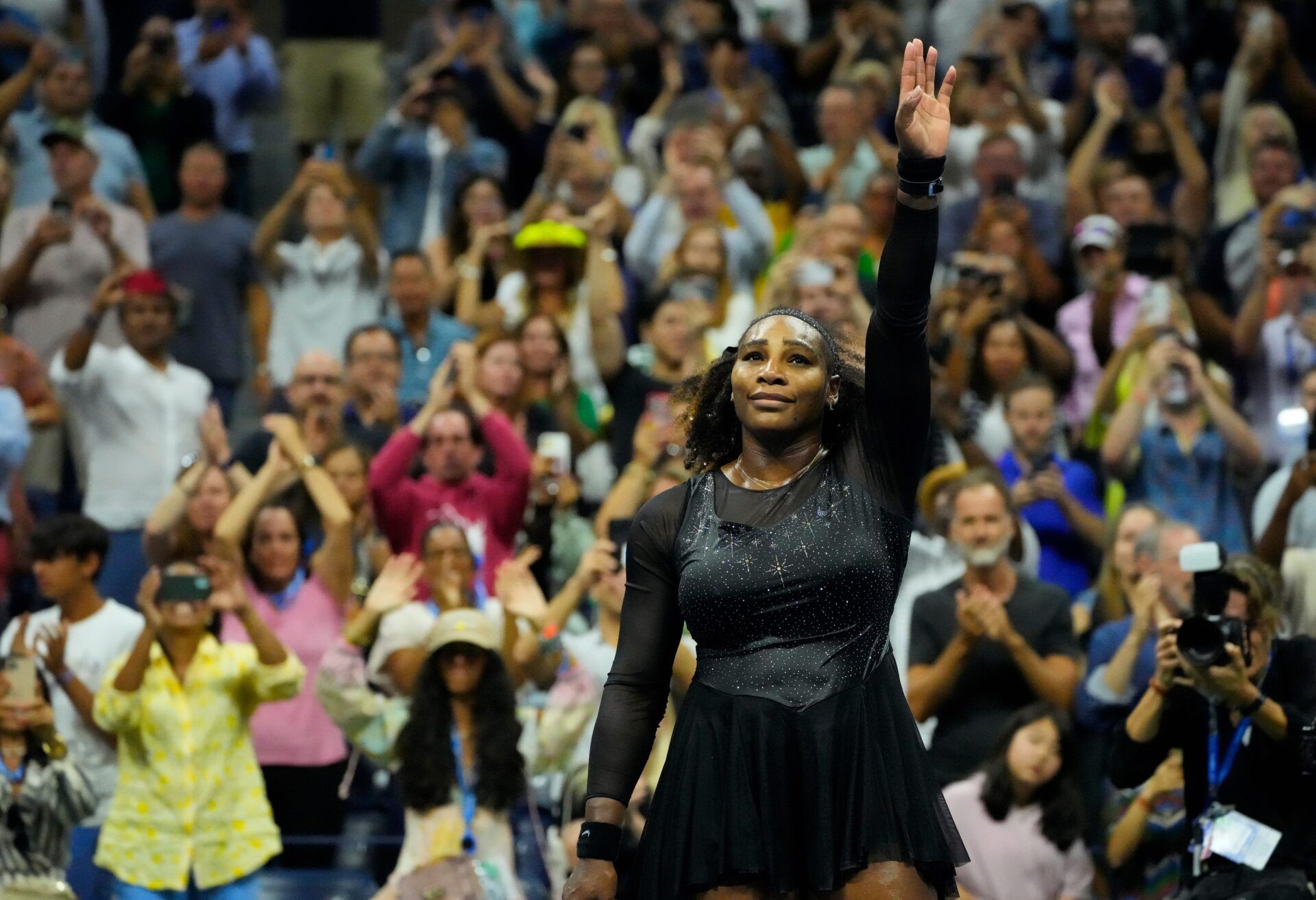 Serena Williams of the USA waves to the crowd after losing to Ajla Tomljanovic of Australia on day five of the 2022 U.S. Open tennis tournament at USTA Billie Jean King National Tennis Center.