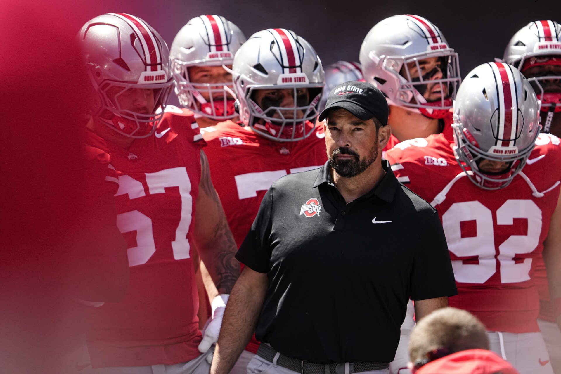 Ohio State Buckeyes head coach Ryan Day leads his team onto the field prior to the NCAA football game against the Texas Longhorns at Ohio Stadium on Aug. 30, 2025.