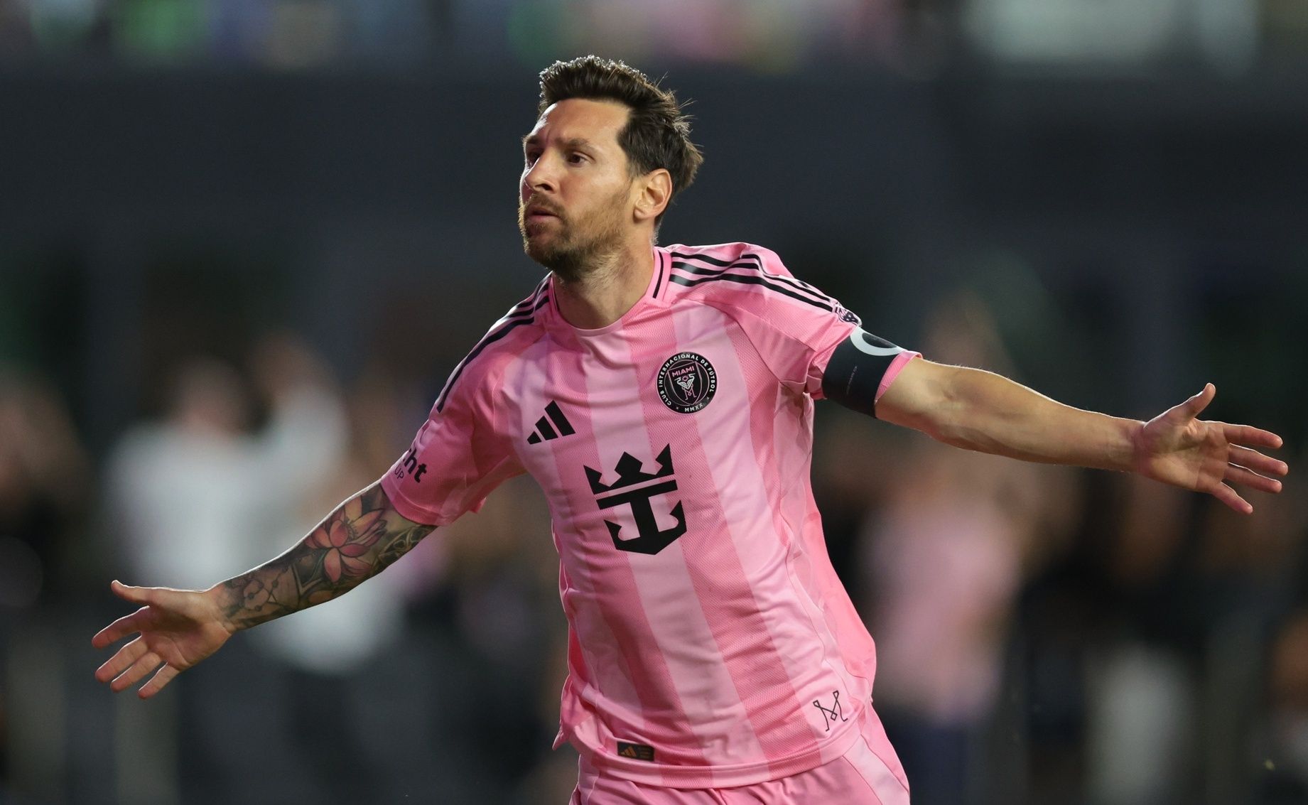 Inter Miami CF forward Lionel Messi (10) celebrates after scoring against Nashville SC during the first half at Chase Stadium.