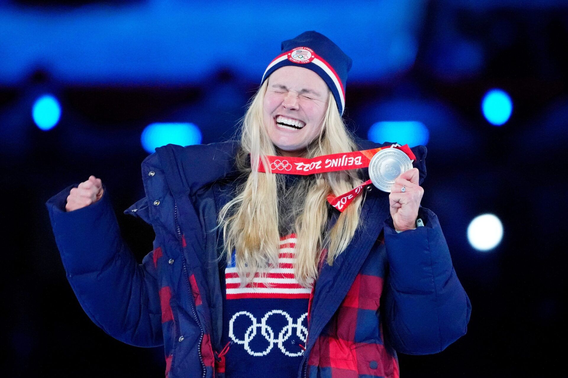 Jessie Diggins (USA) celebrates her silver medal in cross-country skiing women's 30km mass start during the closing ceremony for the Beijing 2022 Olympic Winter Games at Beijing National Stadium.
