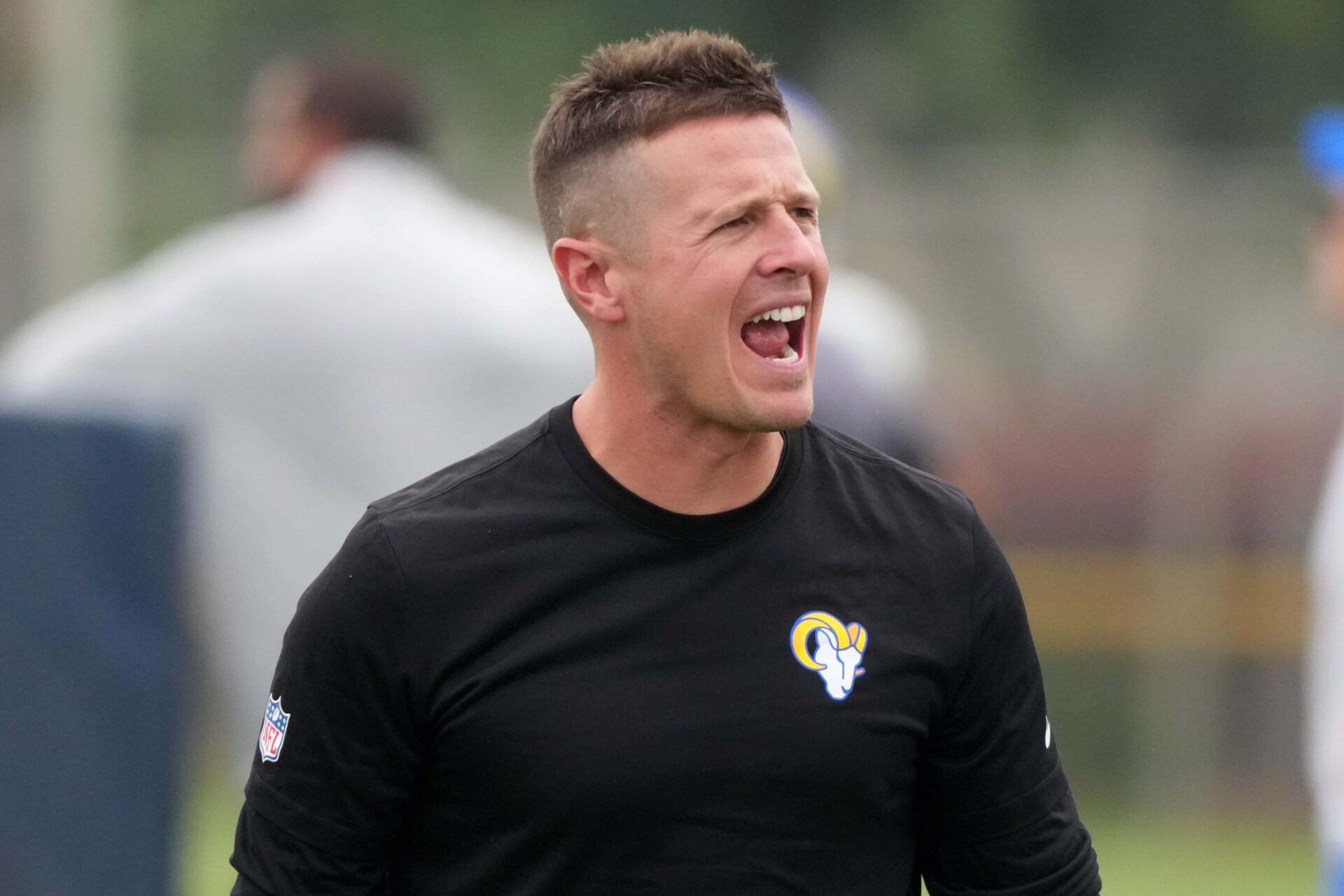 Los Angeles Rams offensive coordinator Mike LaFleur reacts during a joint practice at the Dignity Health Sports Park.