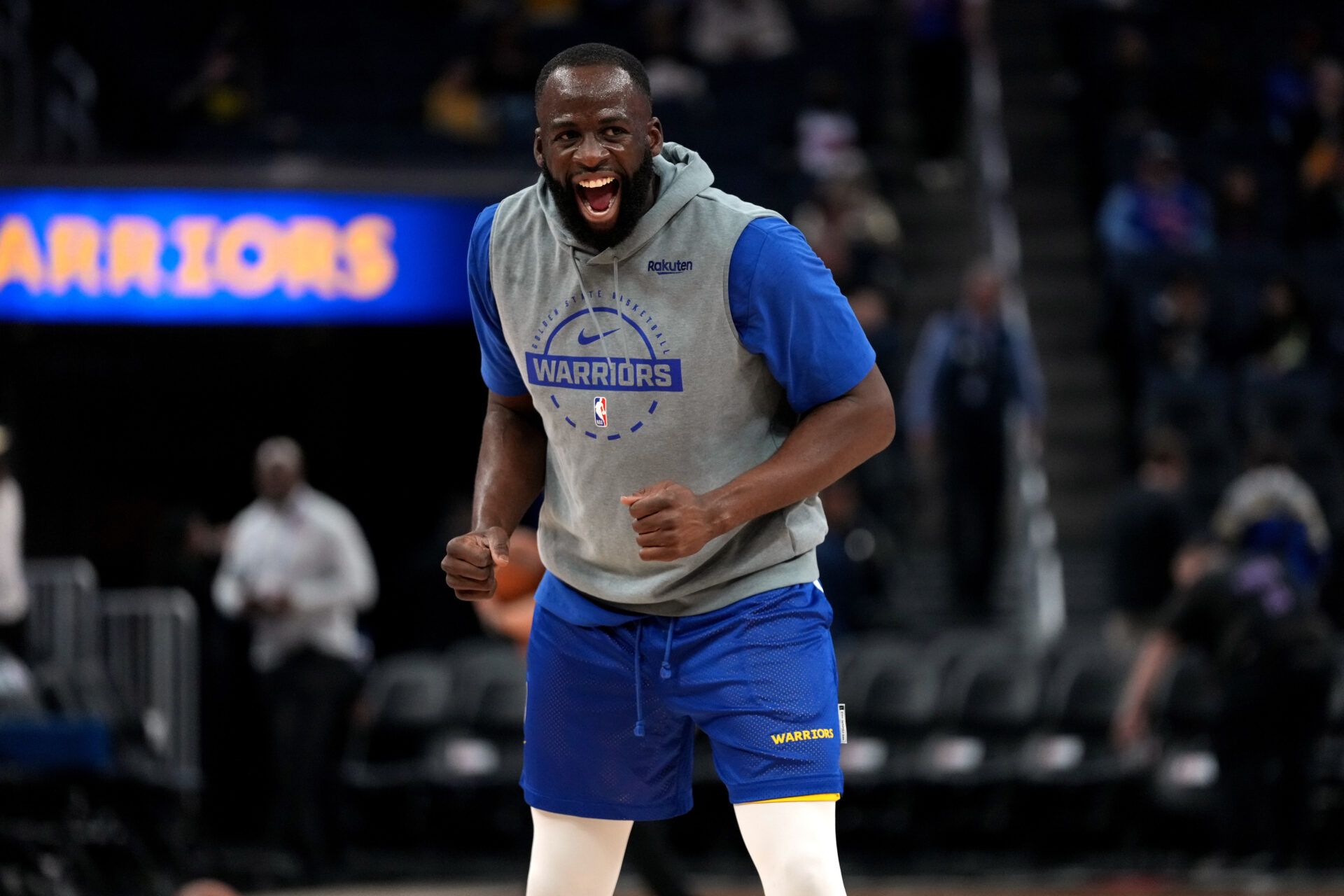 Golden State Warriors forward Draymond Green (23) warms up before a game against the Detroit Pistons at the Chase Center.