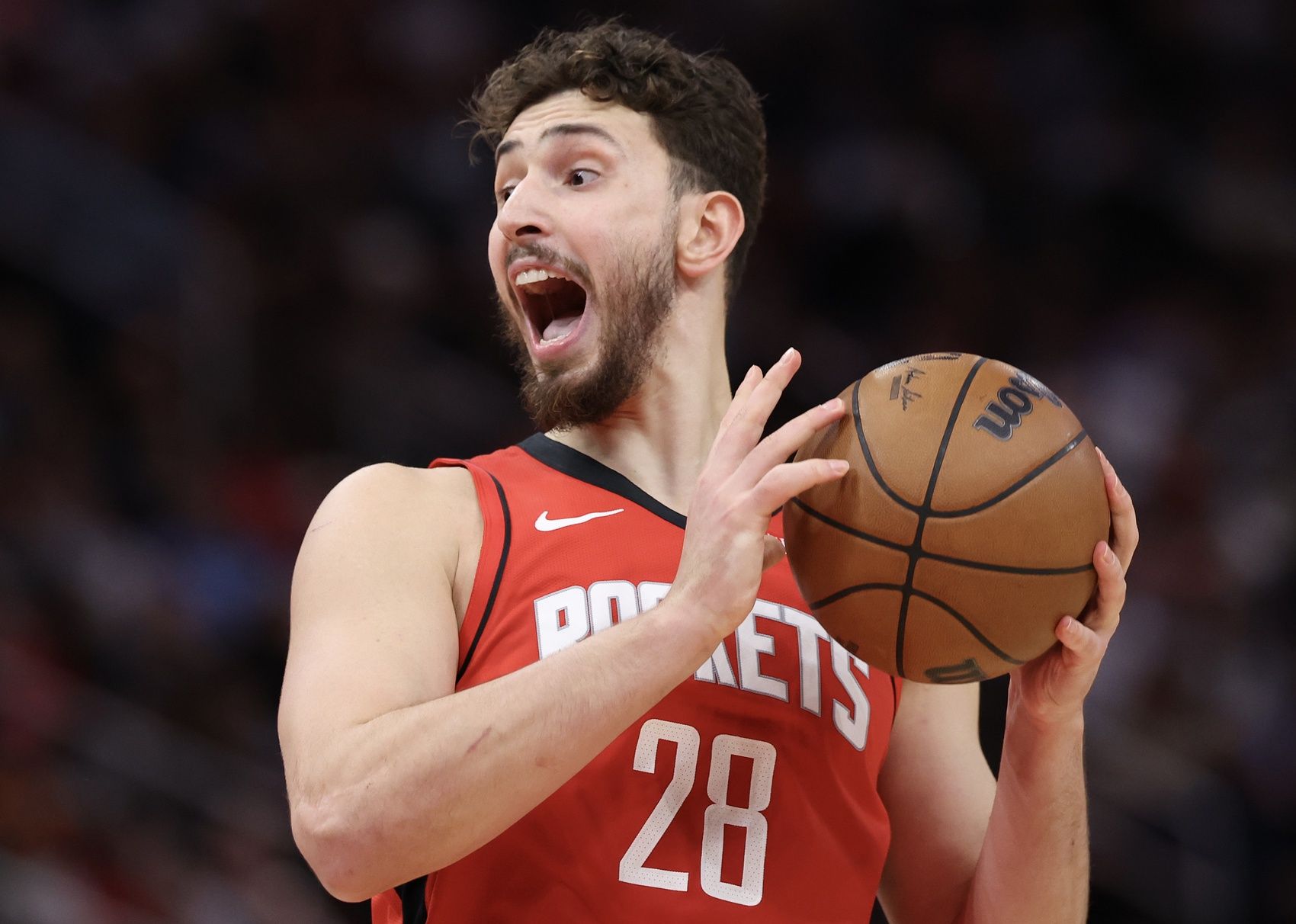 Houston Rockets center Alperen Sengun (28) reacts against the San Antonio Spurs  in the second quarter at Toyota Center.