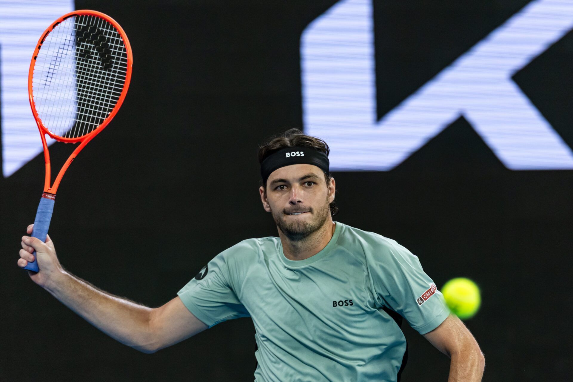 Taylor Fritz of United States in action against Stan Wawrinka of Switzerland in the third round of the mens singles at the Australian Open at John Cain Arena in Melbourne Park.