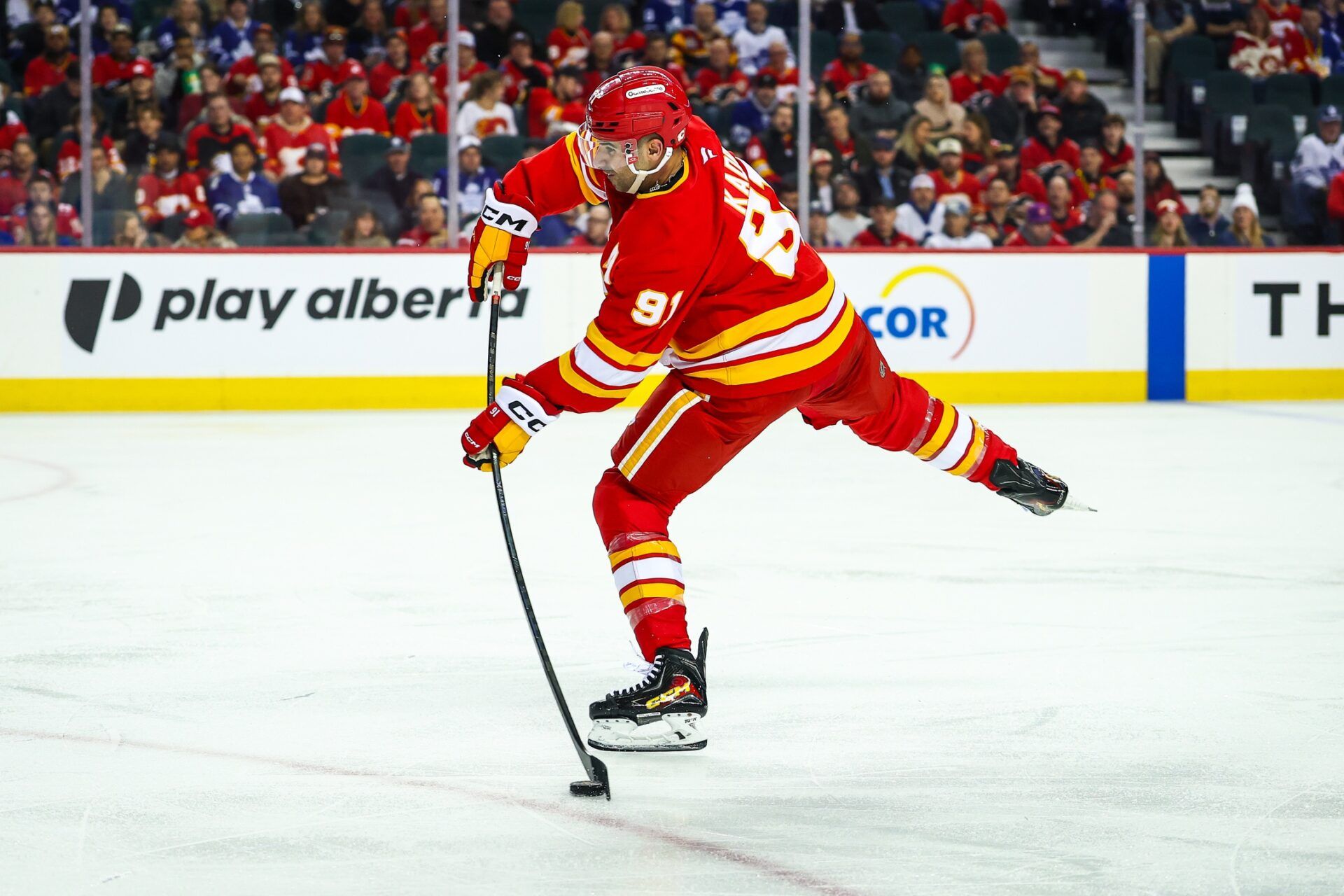 Calgary Flames center Nazem Kadri (91) shoots the puck against the Toronto Maple Leafs during the second period at Scotiabank Saddledome.
