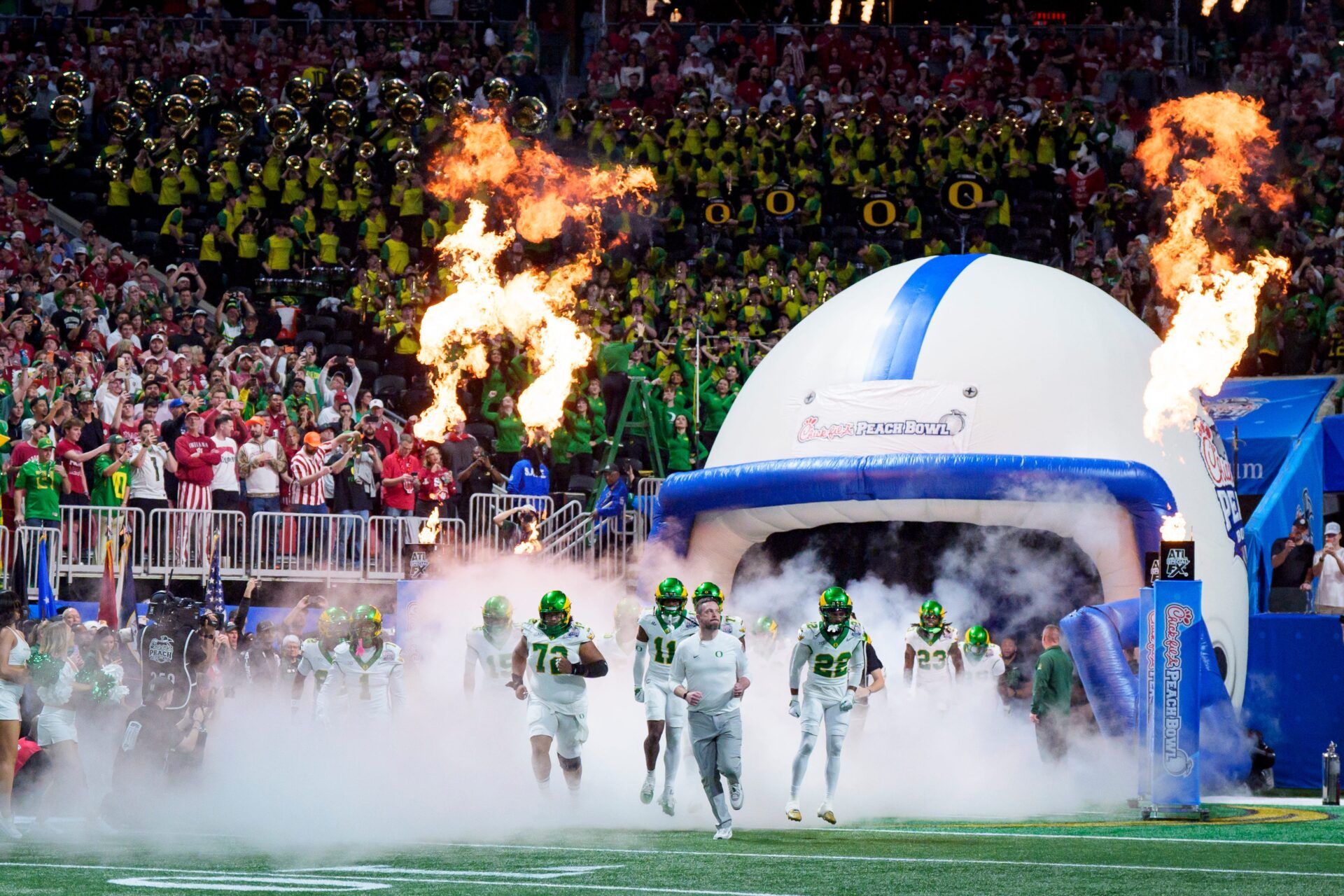 Oregon head coach Dan Lanning leads the Ducks onto the field as the Oregon Ducks face the Indiana Hoosiers in the Peach Bowl on Jan. 9, 2026, at Mercedes-Benz Stadium in Atlanta, Georgia.